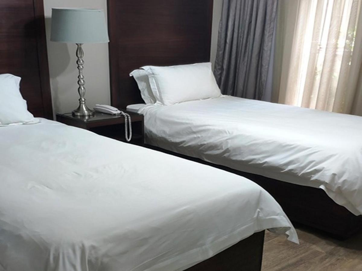 Standard Twin Room - Photo 1