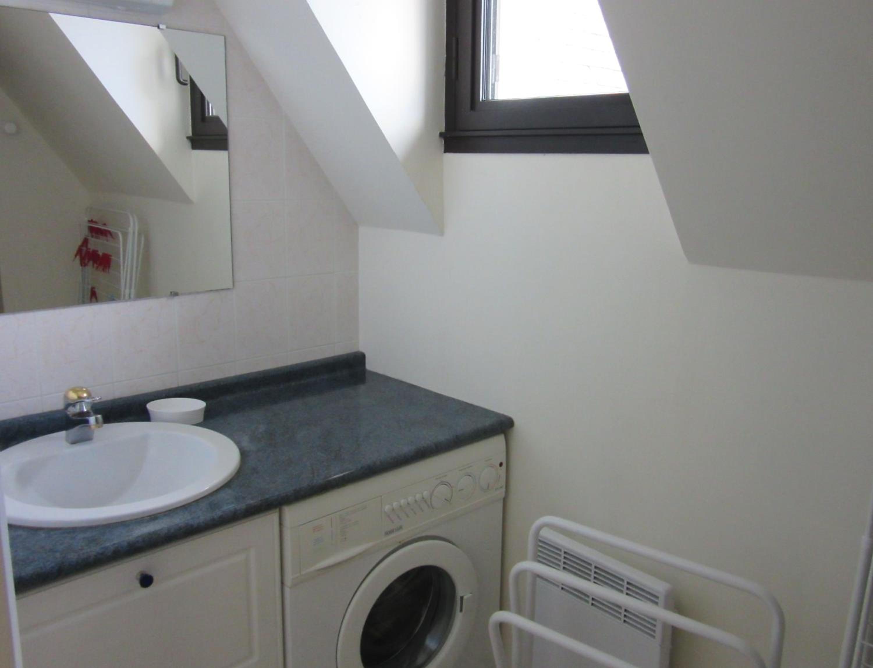 Three-Bedroom Apartment - Photo 19