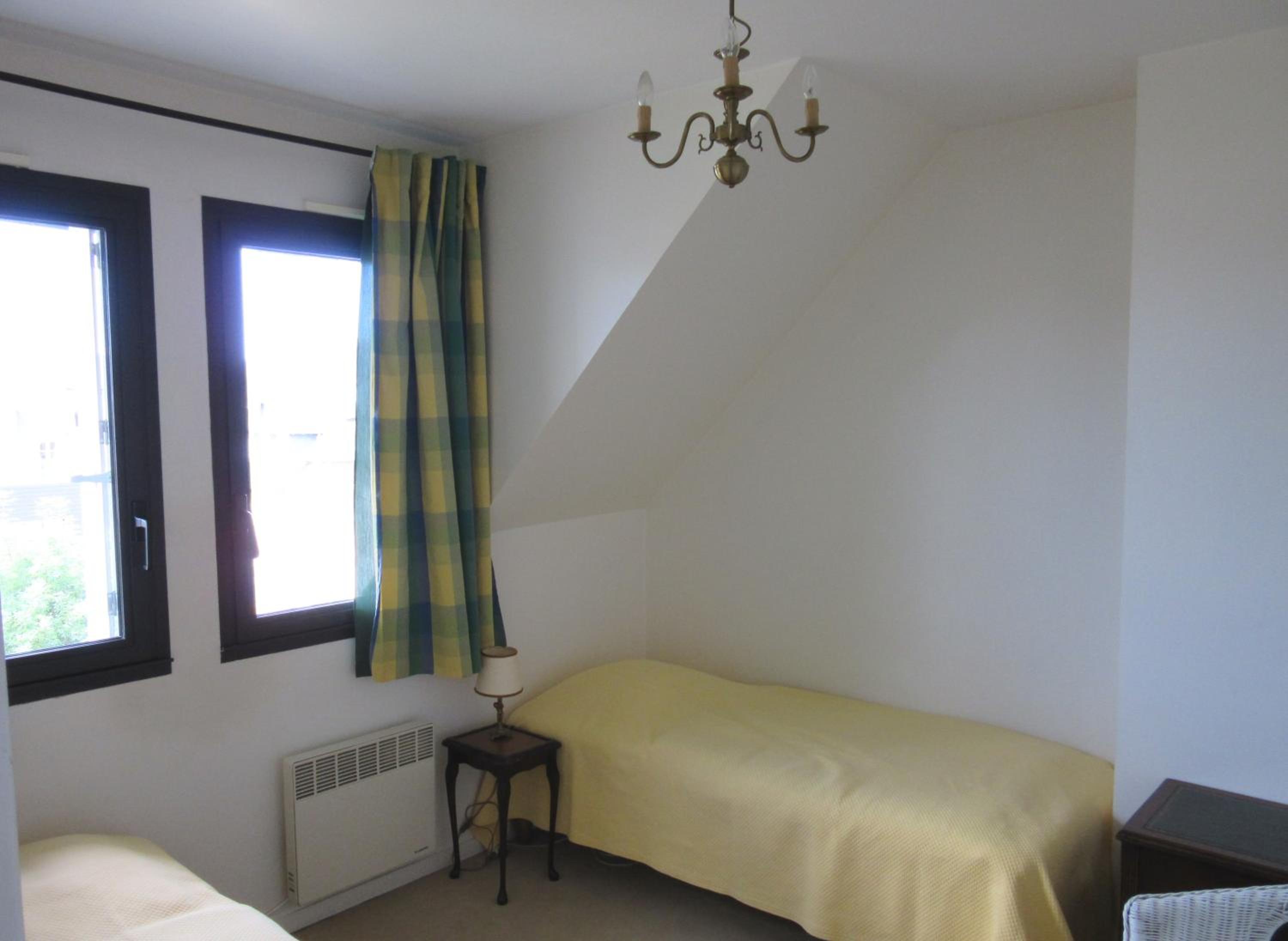 Three-Bedroom Apartment - Photo 17