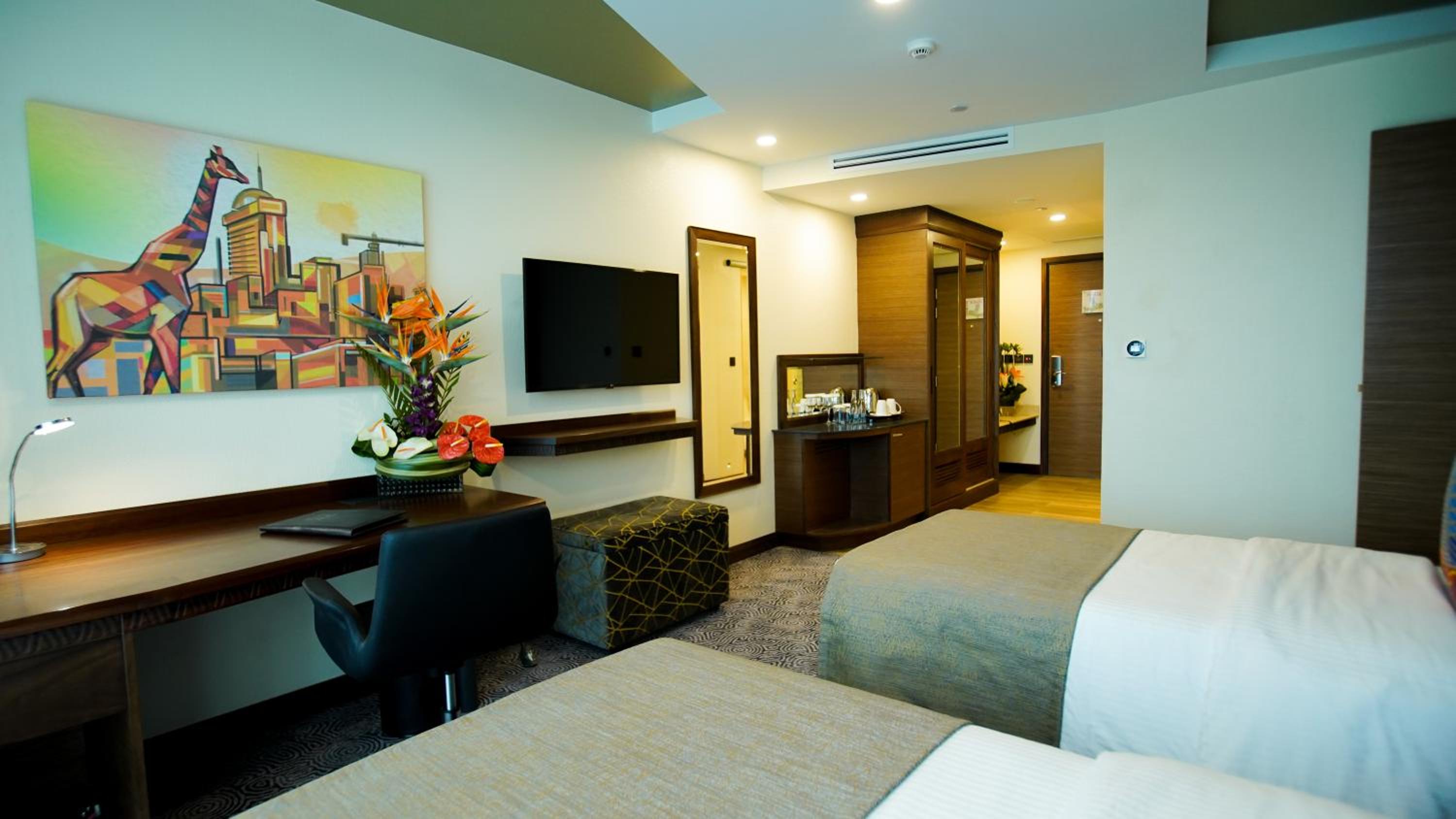 Panafric Deluxe Twin Room - Photo 5