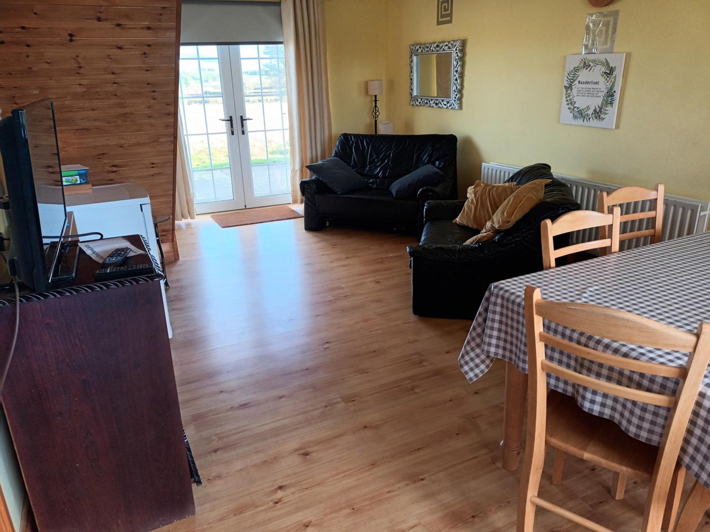 Three-Bedroom House - Photo 2