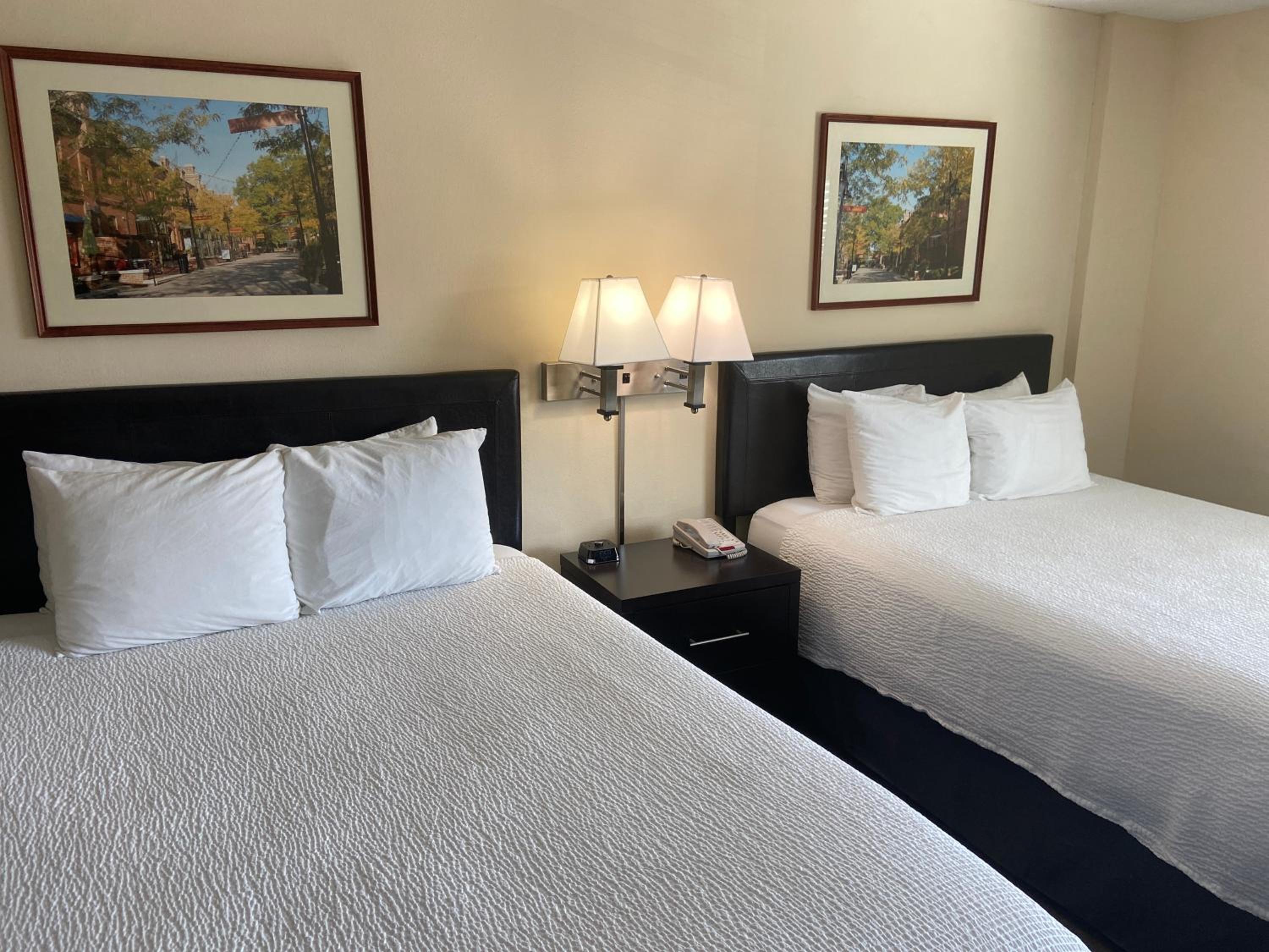 Queen Room with Two Queen Beds - Photo 1