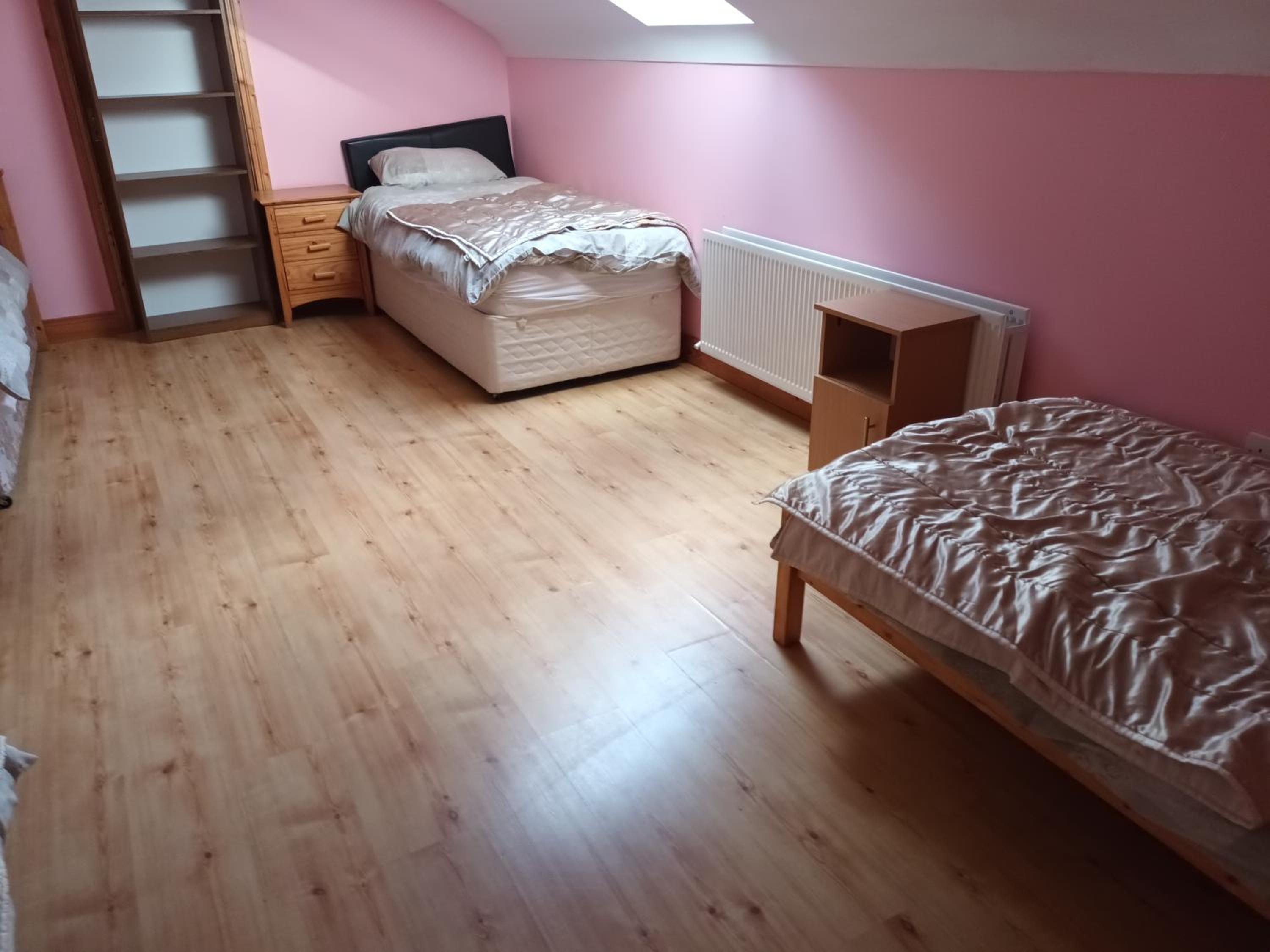 Three-Bedroom House - Photo 15