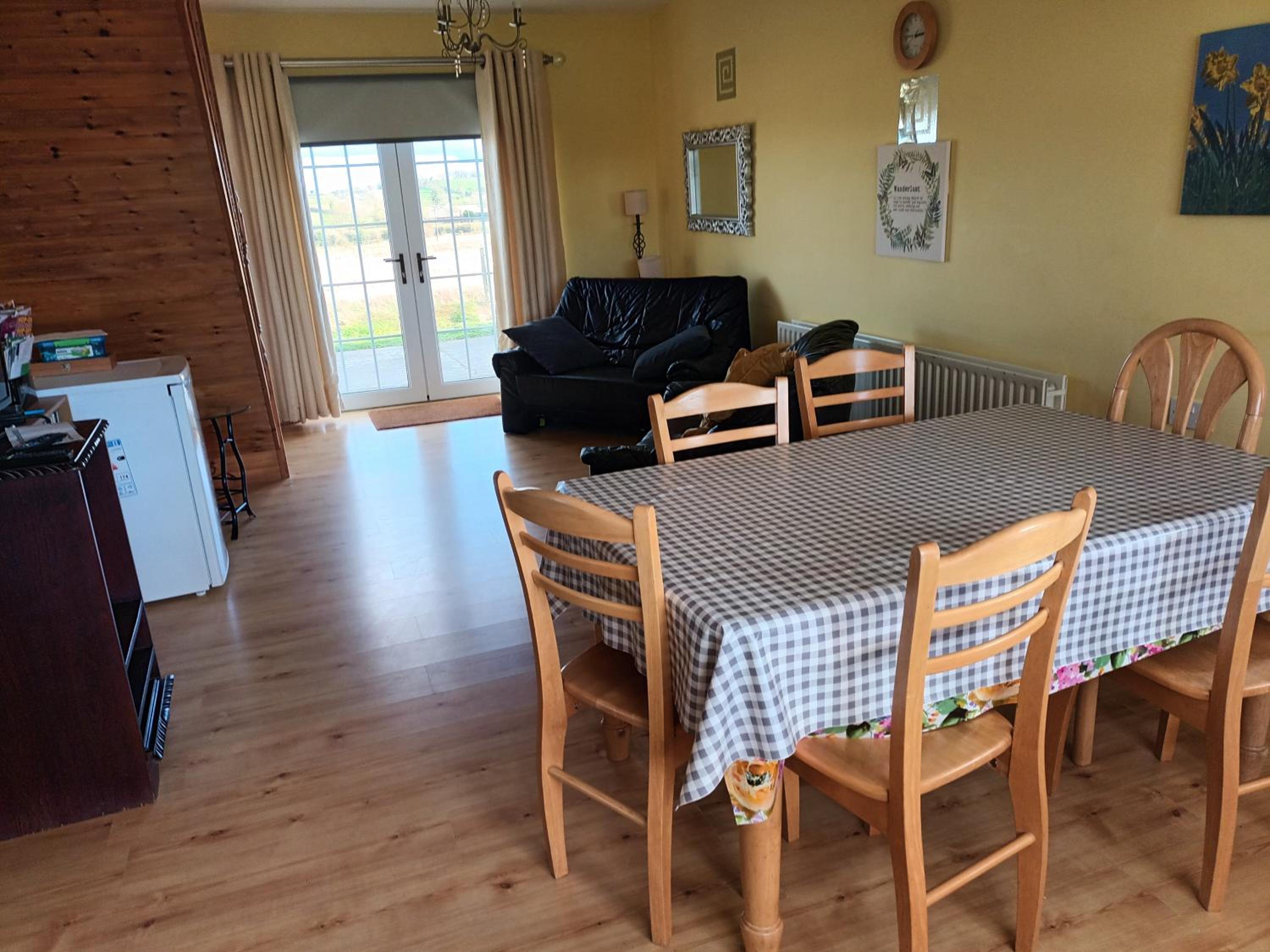 Three-Bedroom House - Photo 31