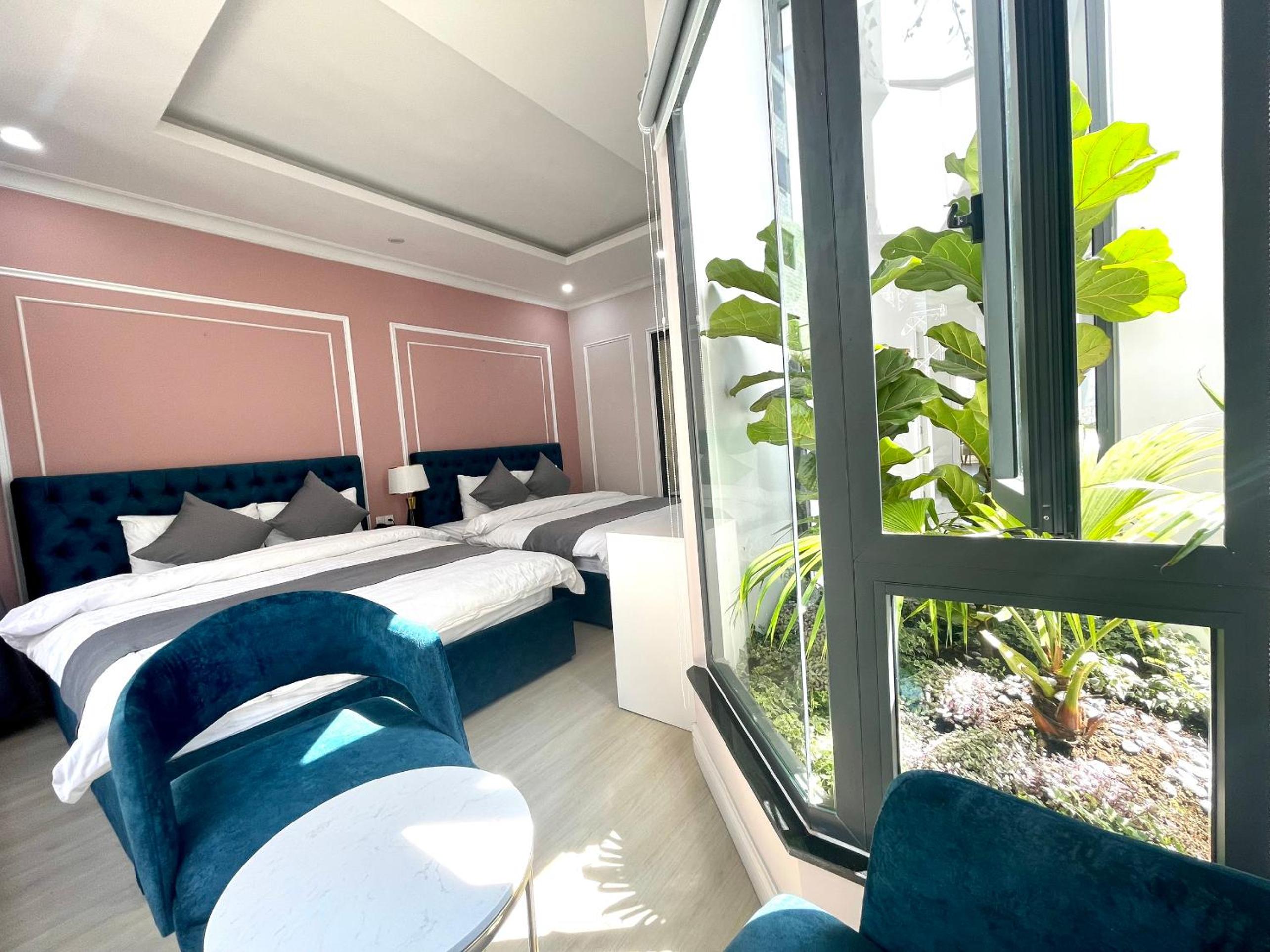 Quadruple Room with Balcony - Photo 1