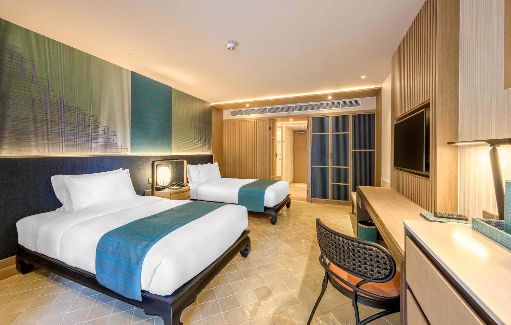 Premium Twin Room with Balcony and Pool View - Photo 1