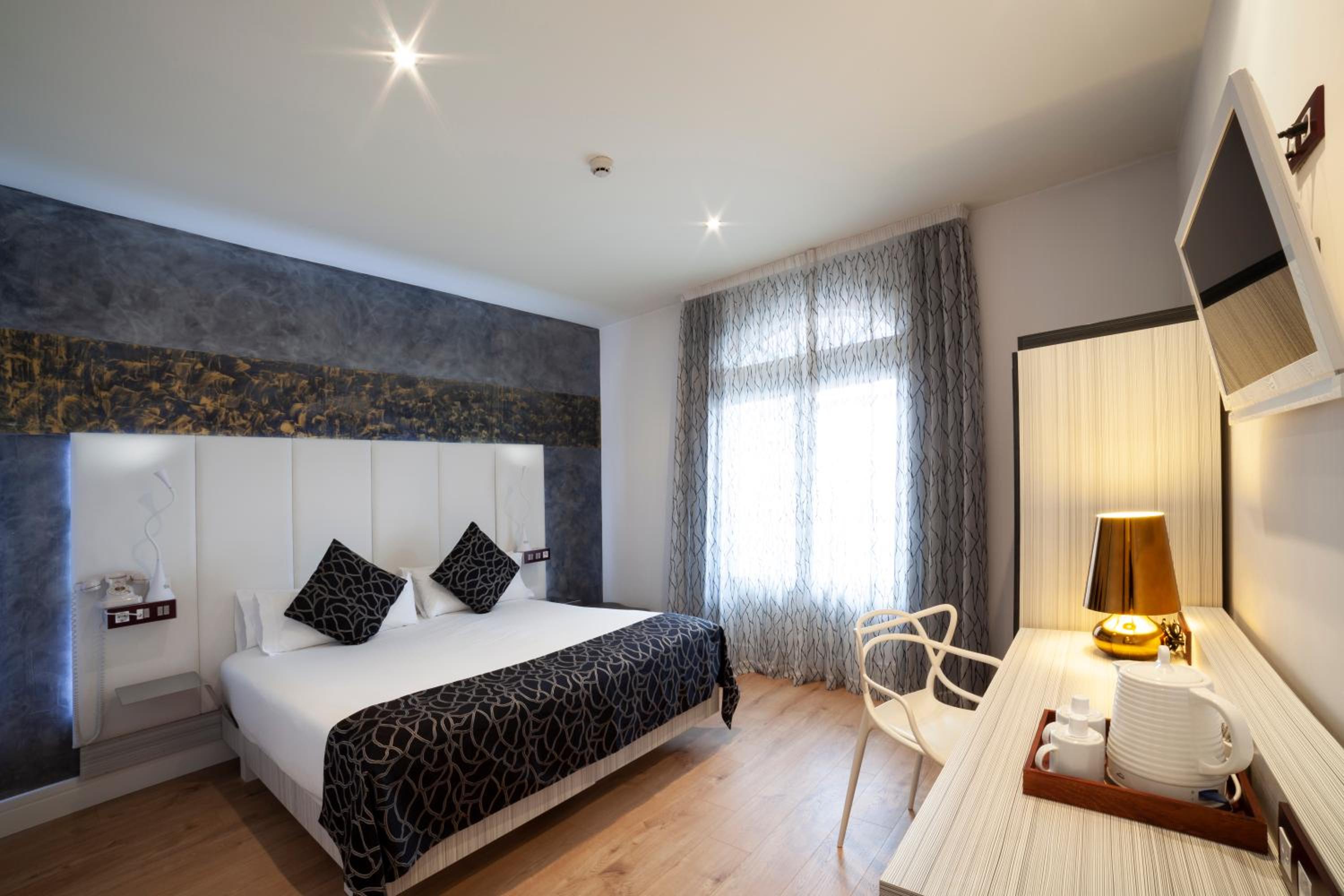 Habitación Doble o con Dos Camas (1-2 Adultos)