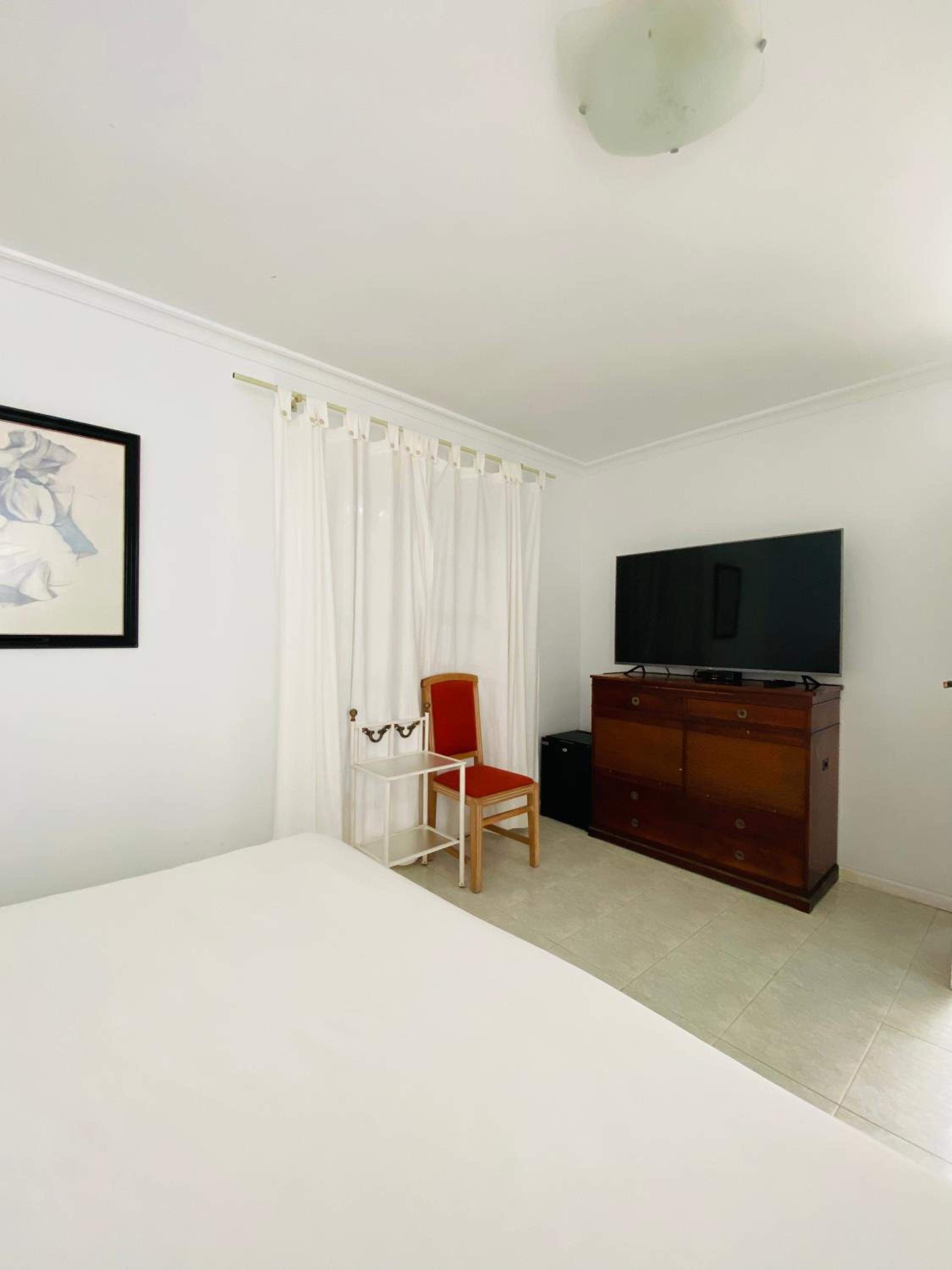 Suite Queen con vista a la piscina