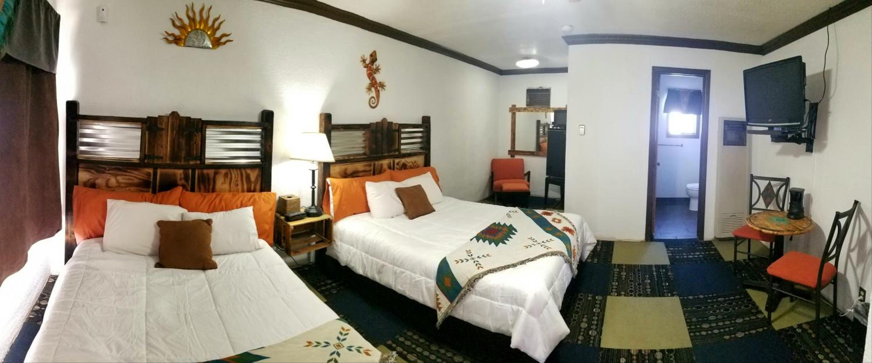 Deluxe Queen Room With Two Queen Beds photo 2