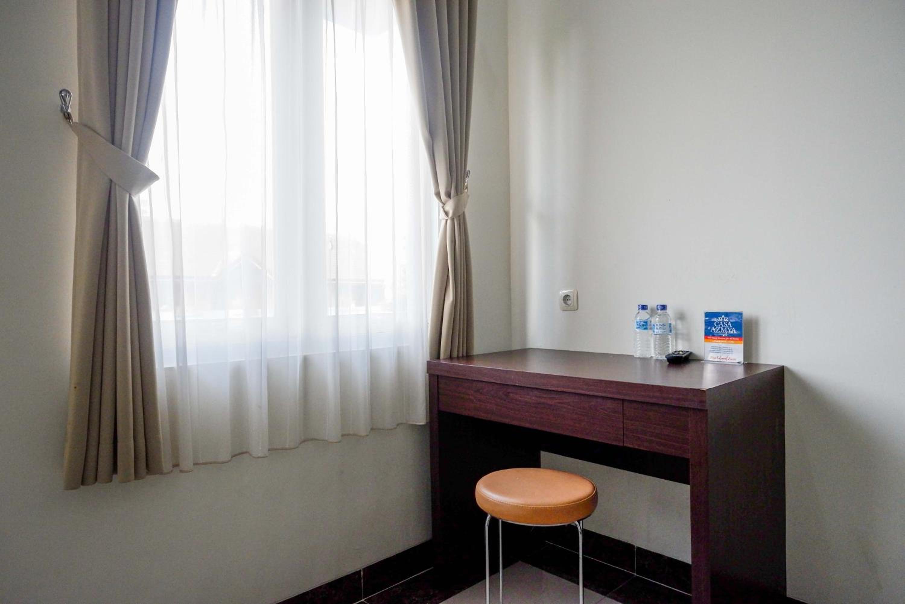 Deluxe Room - Photo 13