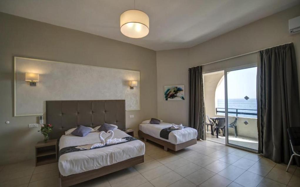 Quadruple Room with Sea View - Photo 1