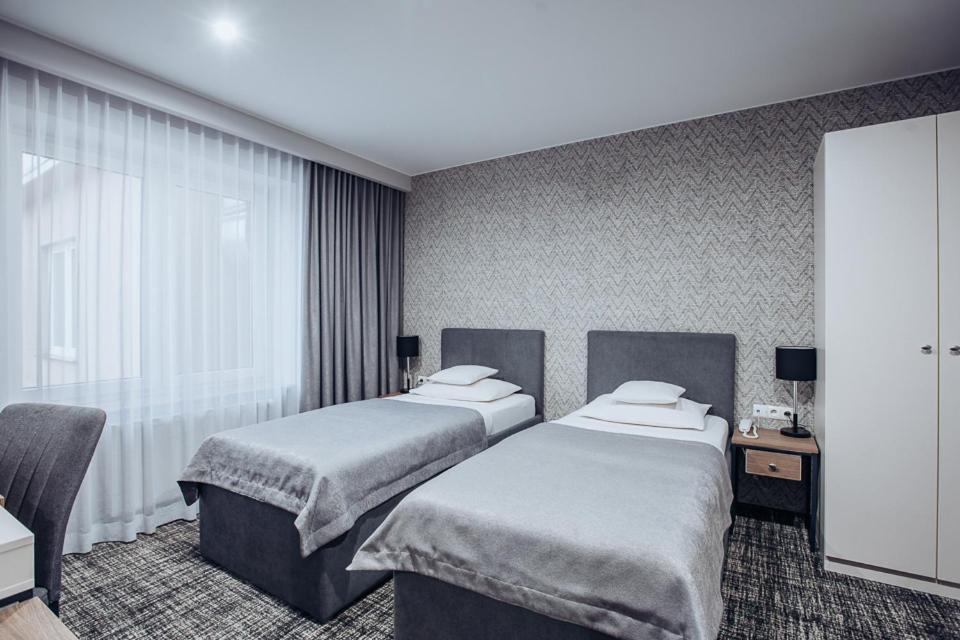 Deluxe Twin Room - Photo 2