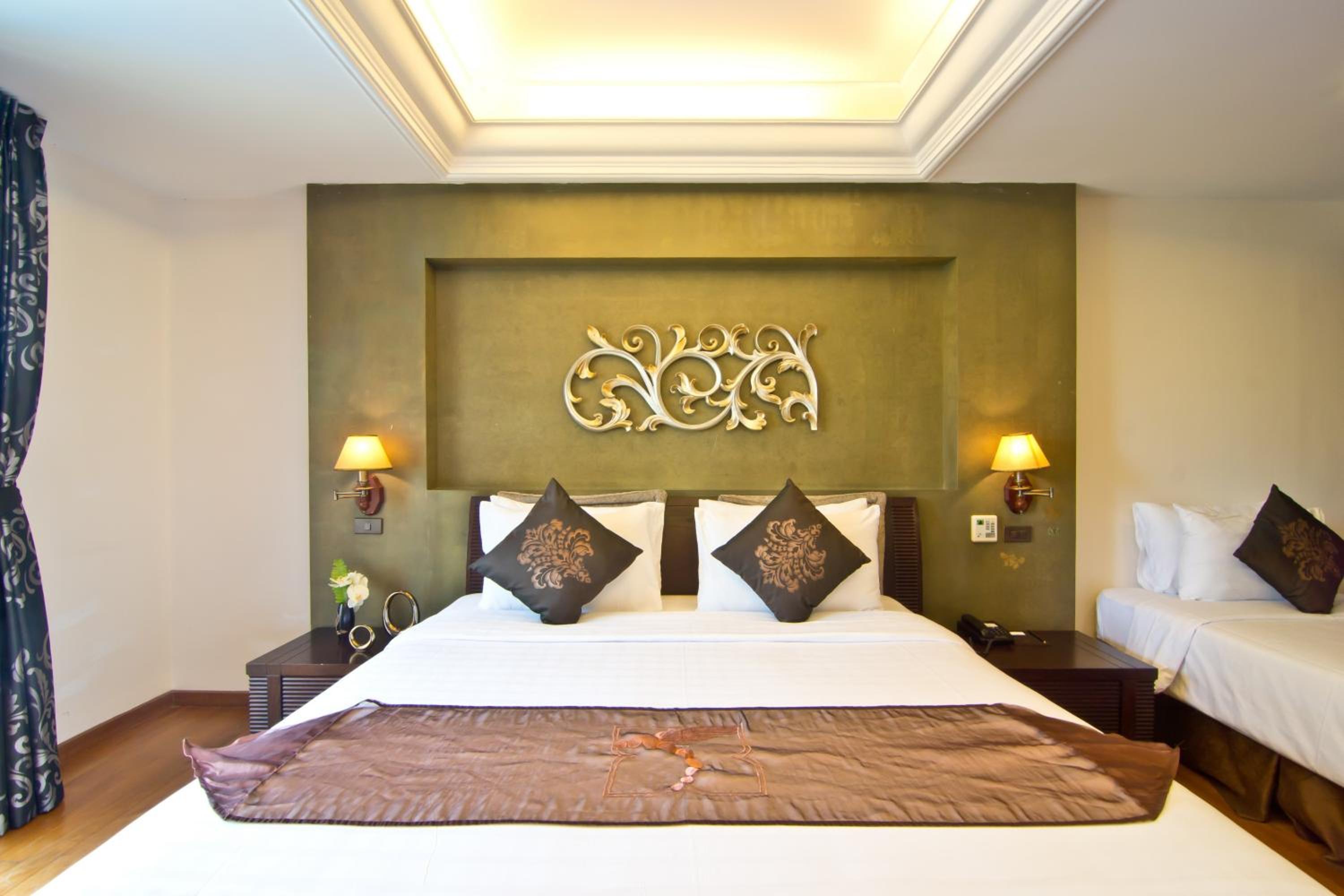 Deluxe Triple Room - Photo 9