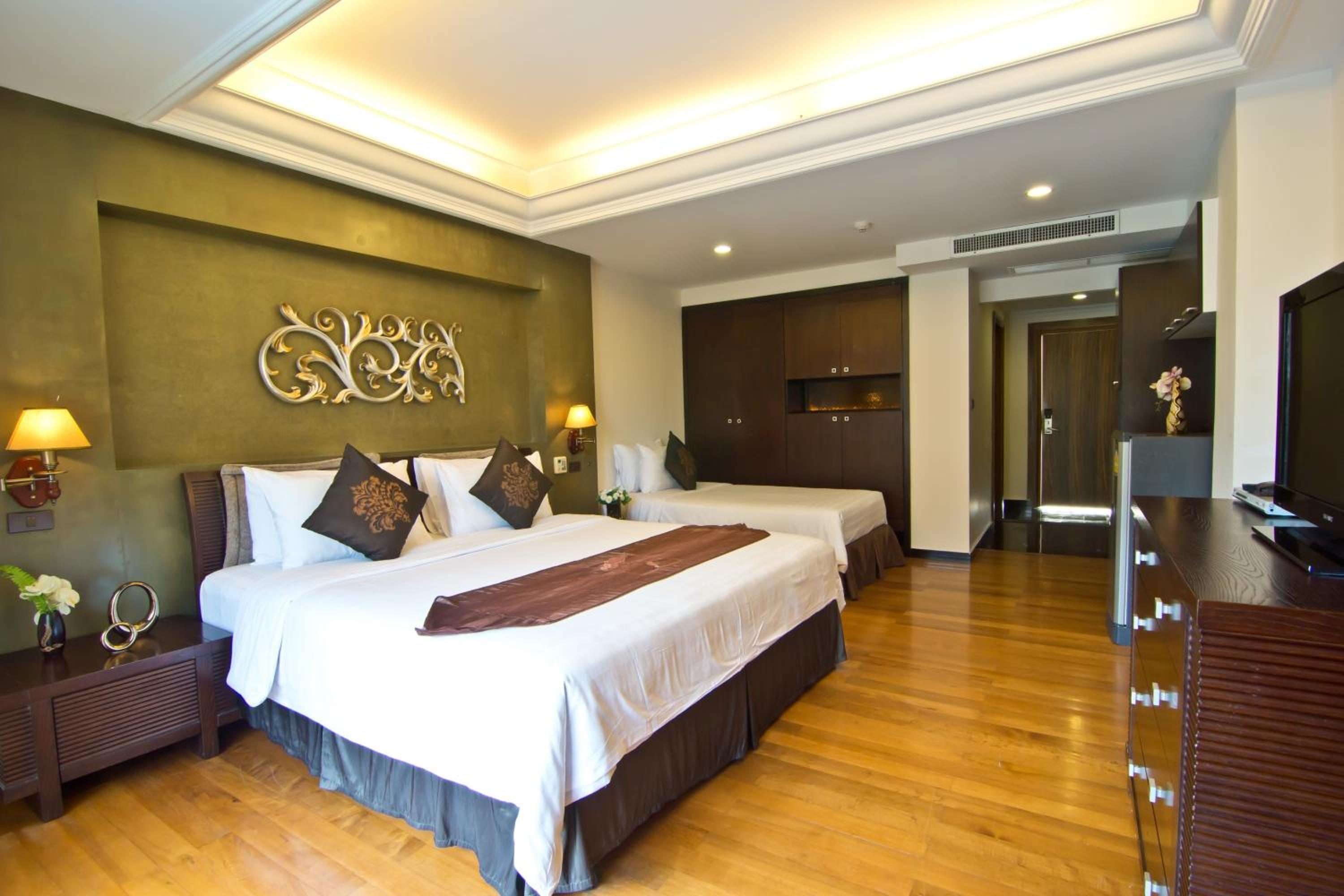 Deluxe Triple Room - Photo 10