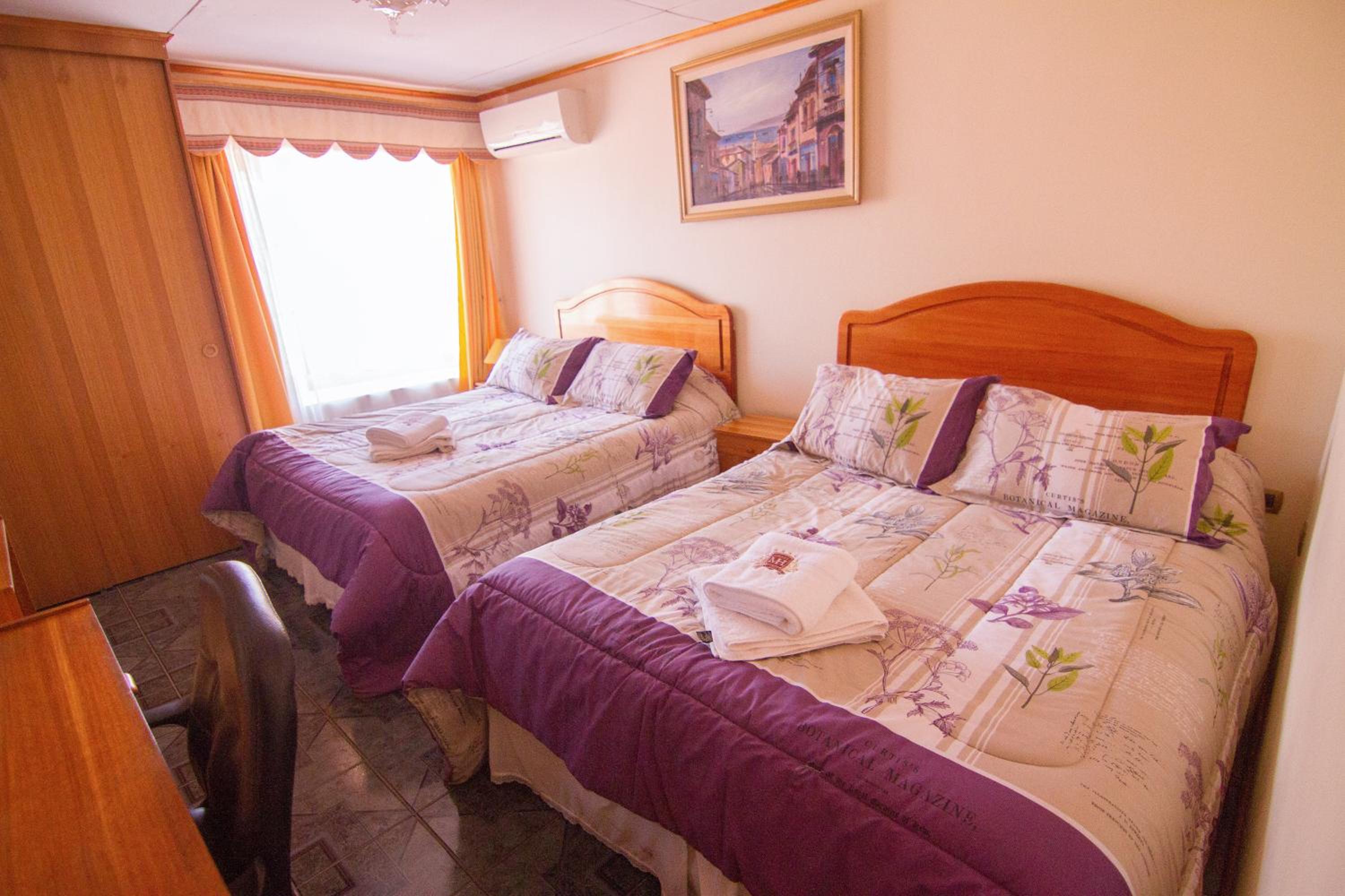 Deluxe Queen Room with Two Queen Beds photo 3