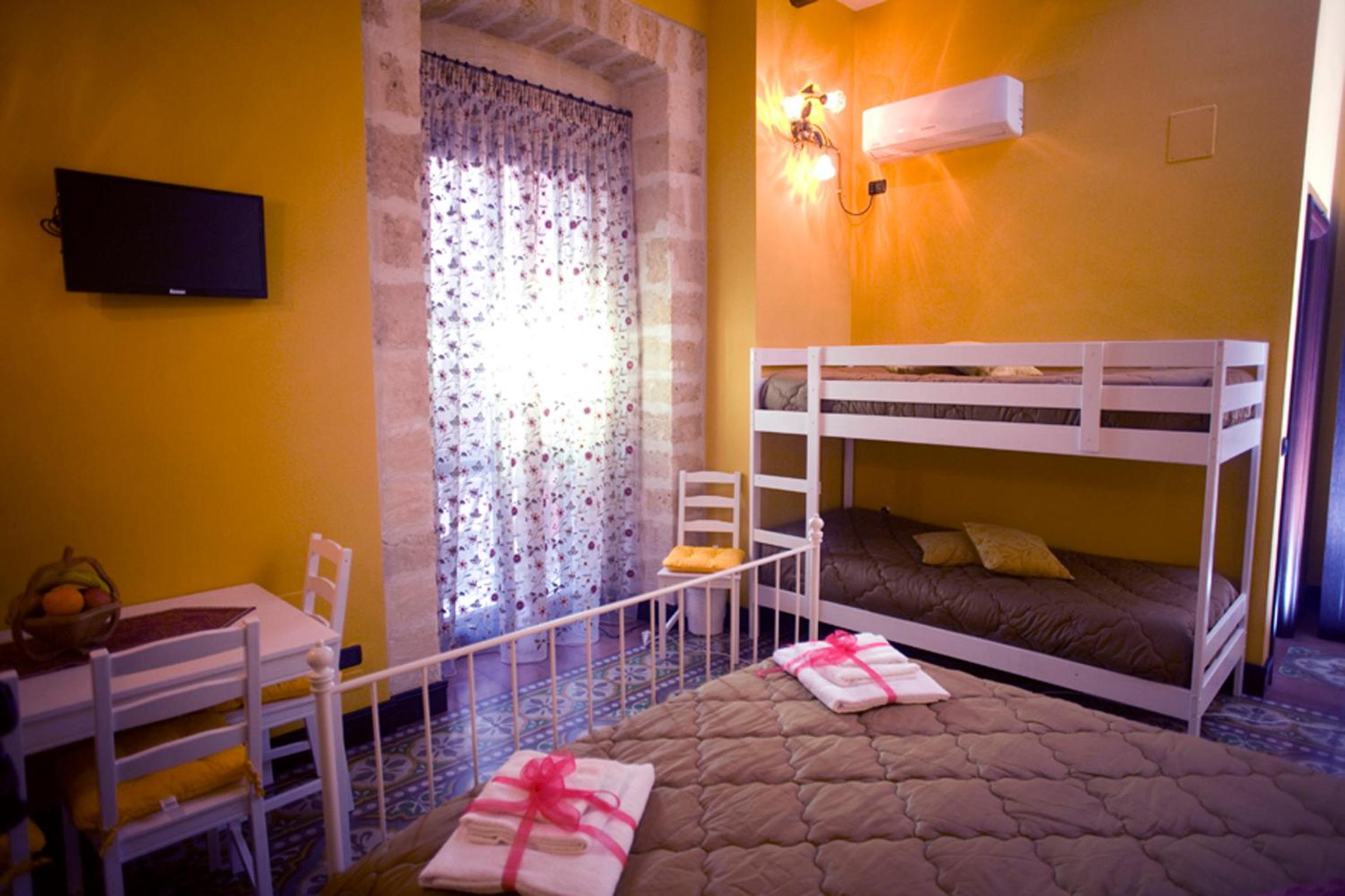 Quadruple Room with Balcony photo 1
