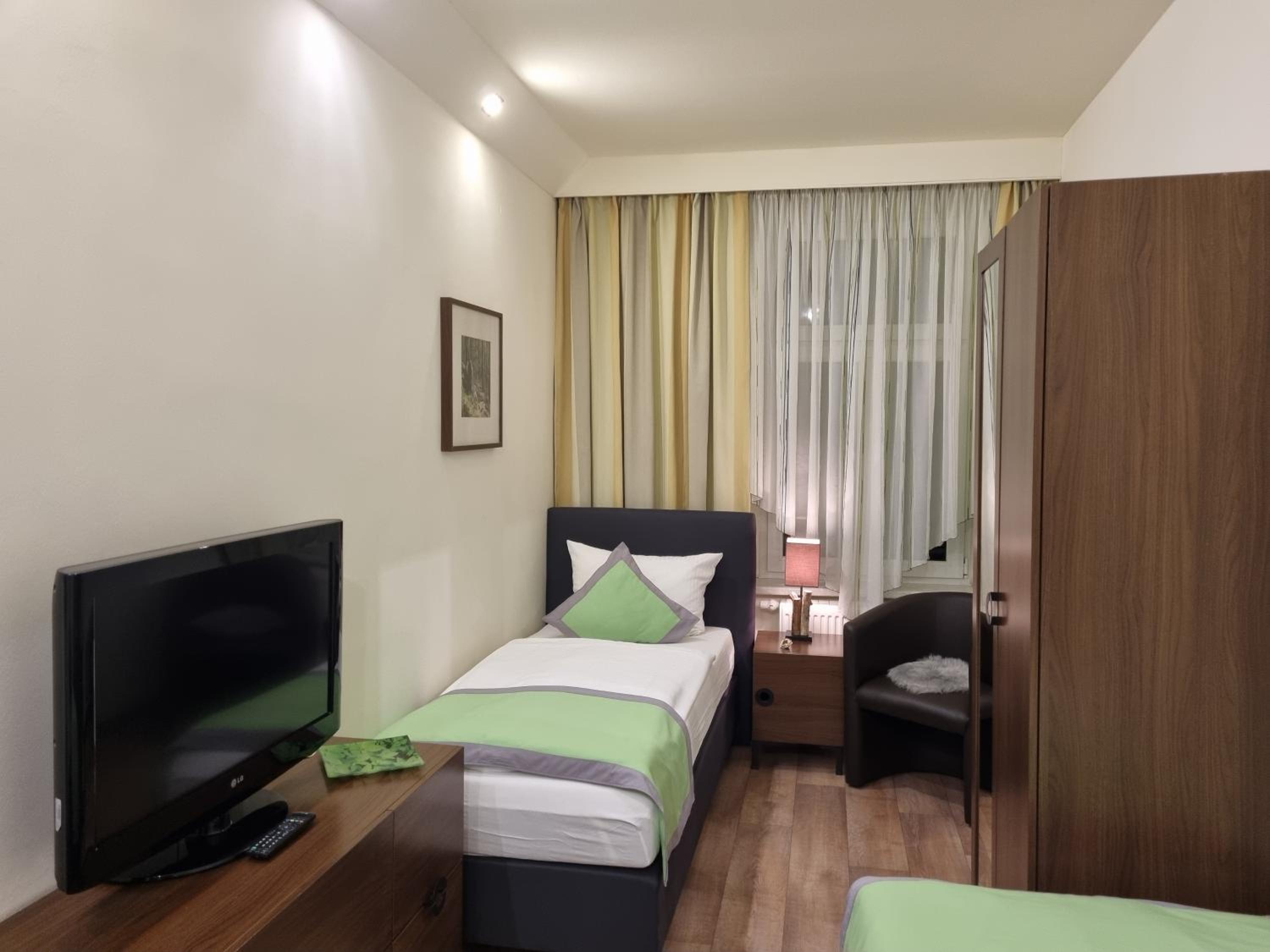Three-Bedroom Apartment - Photo 1