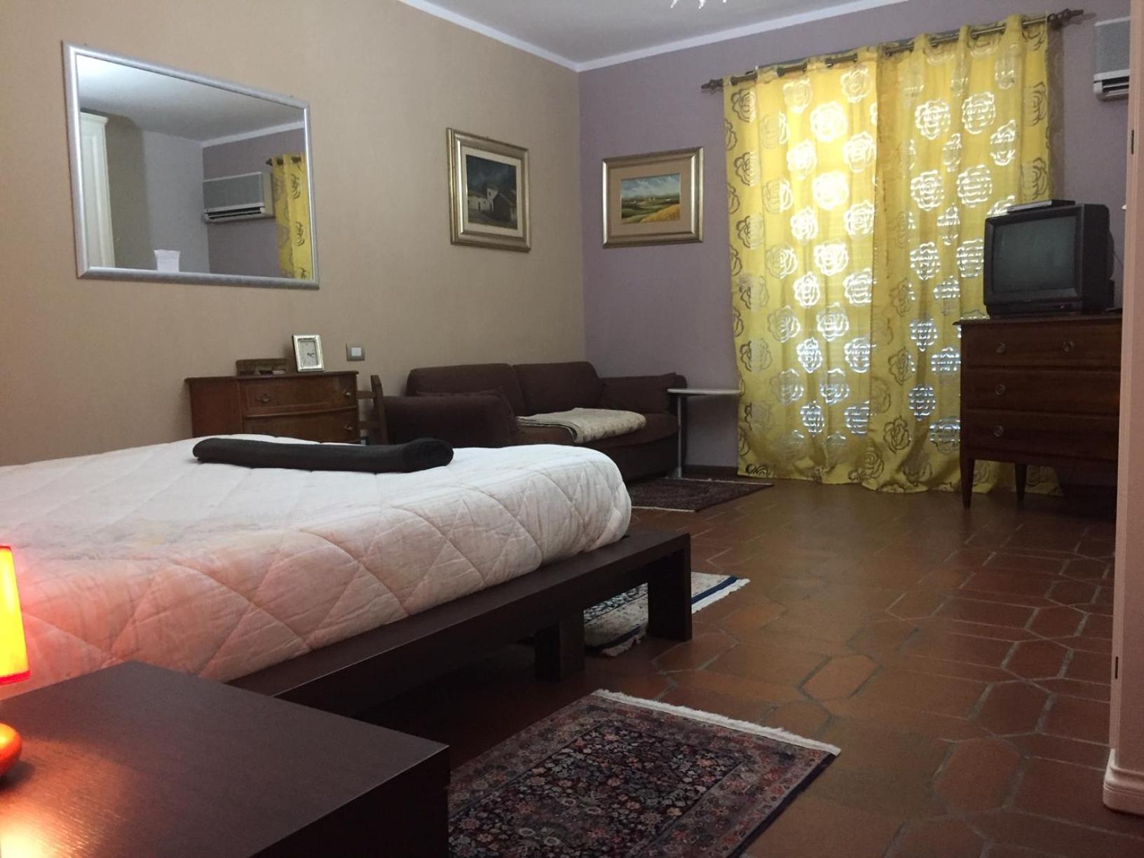 Quadruple Room with Balcony - Photo 21