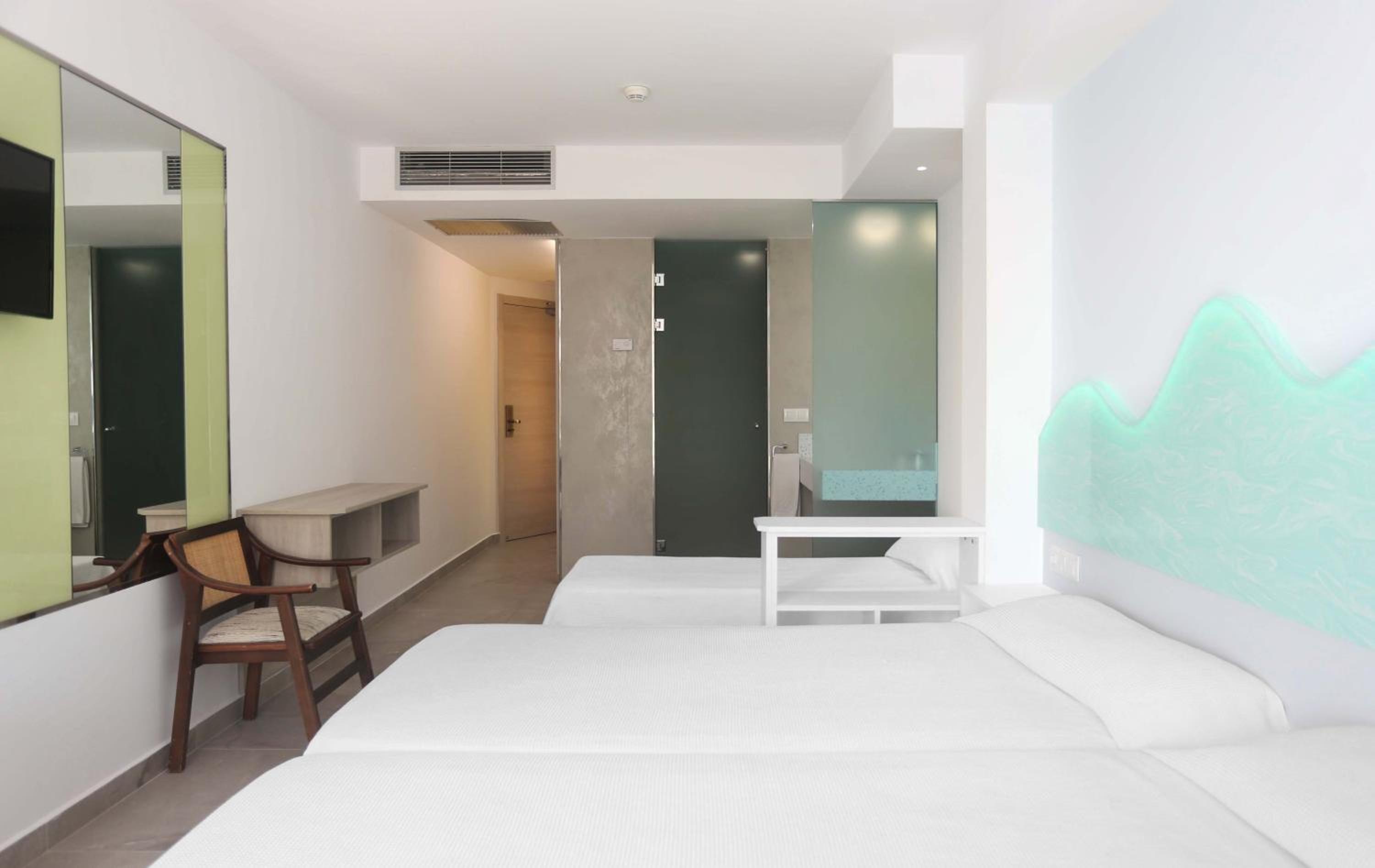 Triple Room (2 Adults + 1 Child) photo 2