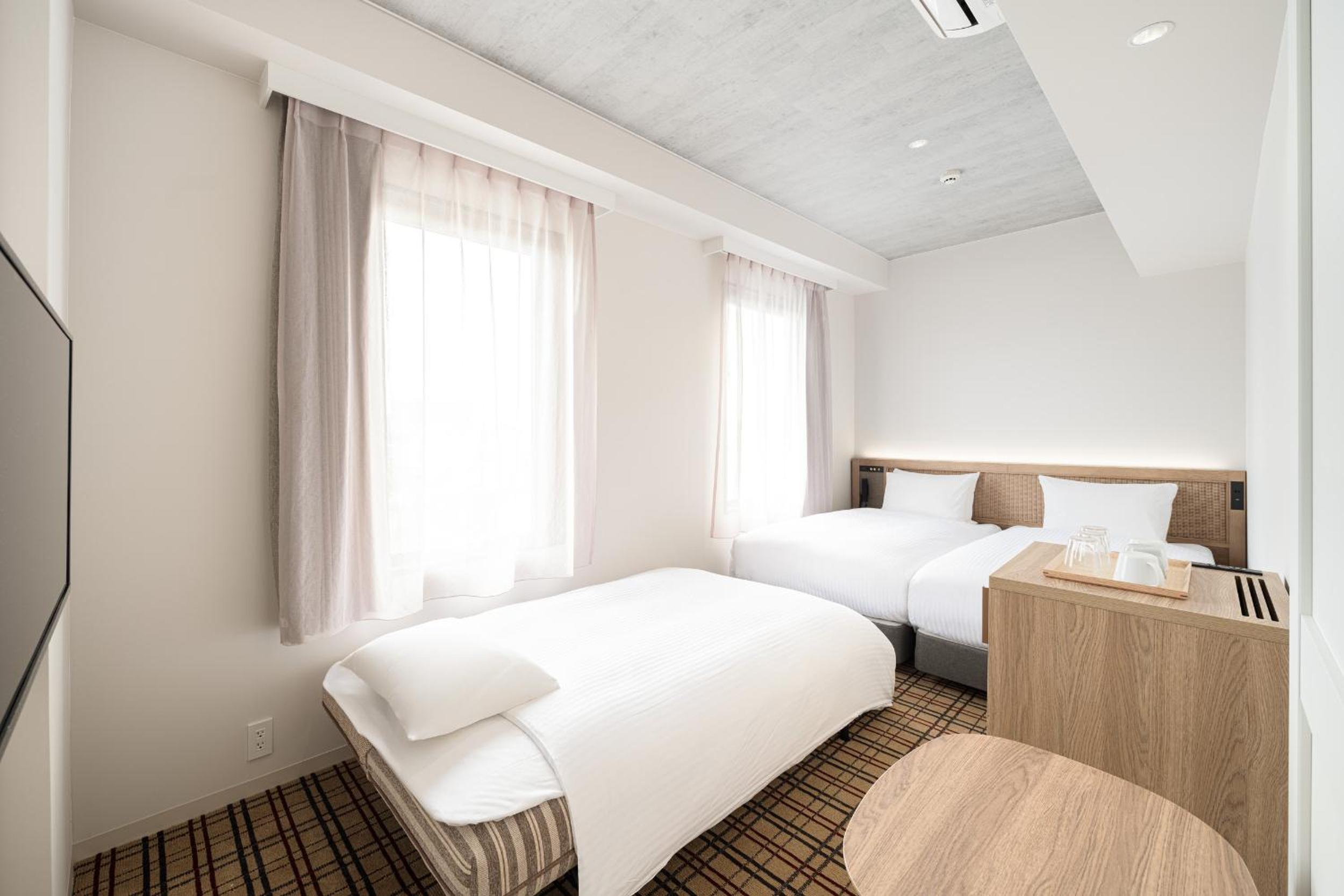 Economy Twin Room - Photo 5