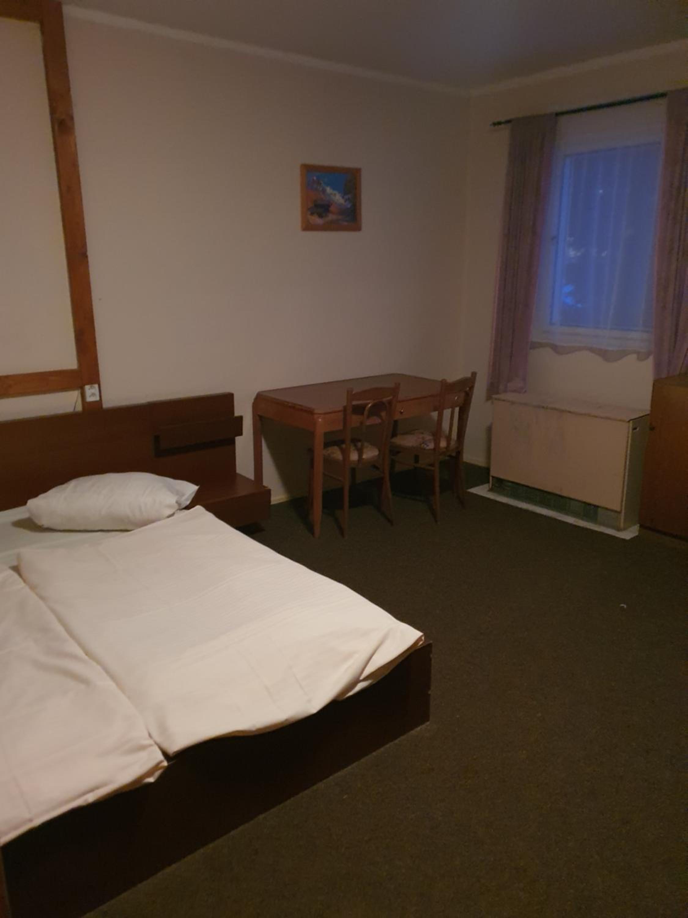 Economy Quadruple Room - Photo 1