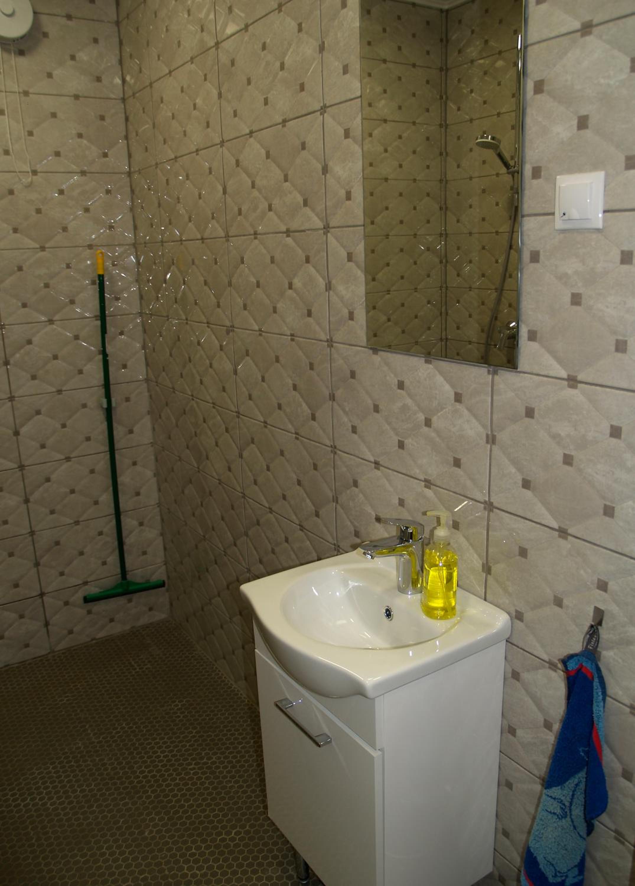 Three-Bedroom House - Photo 12