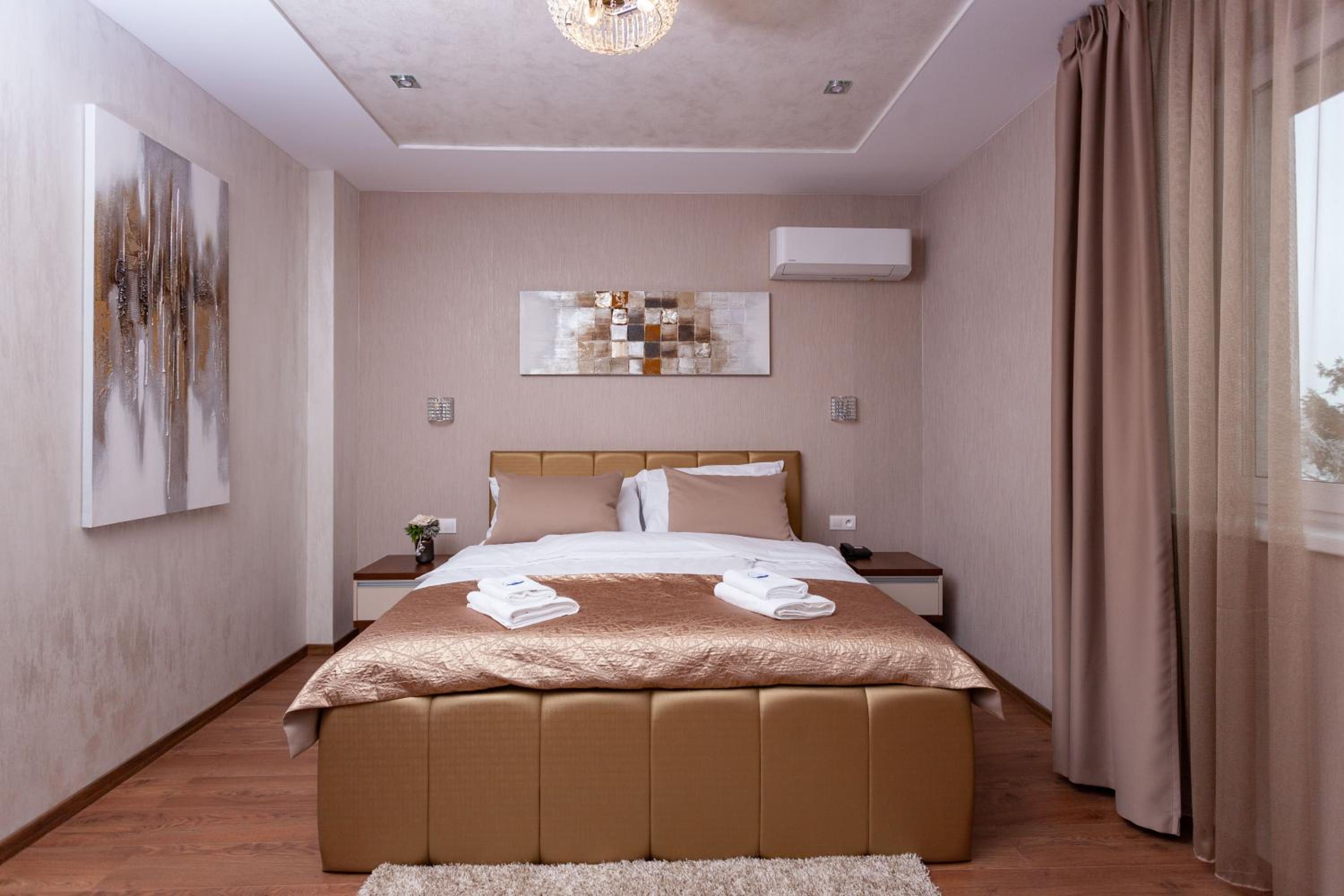 Deluxe Queen Room with Two Queen Beds - Photo 1
