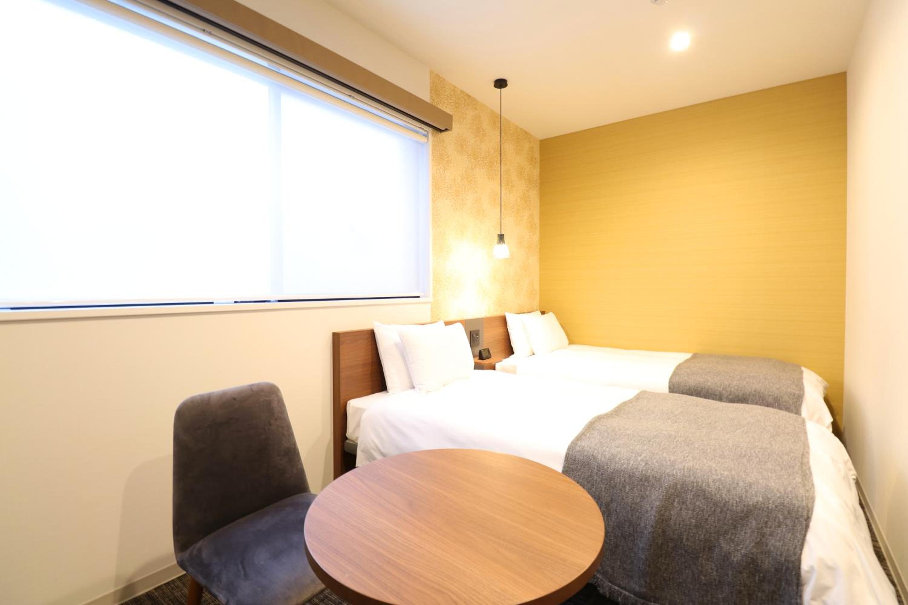 Twin Room - Photo 8