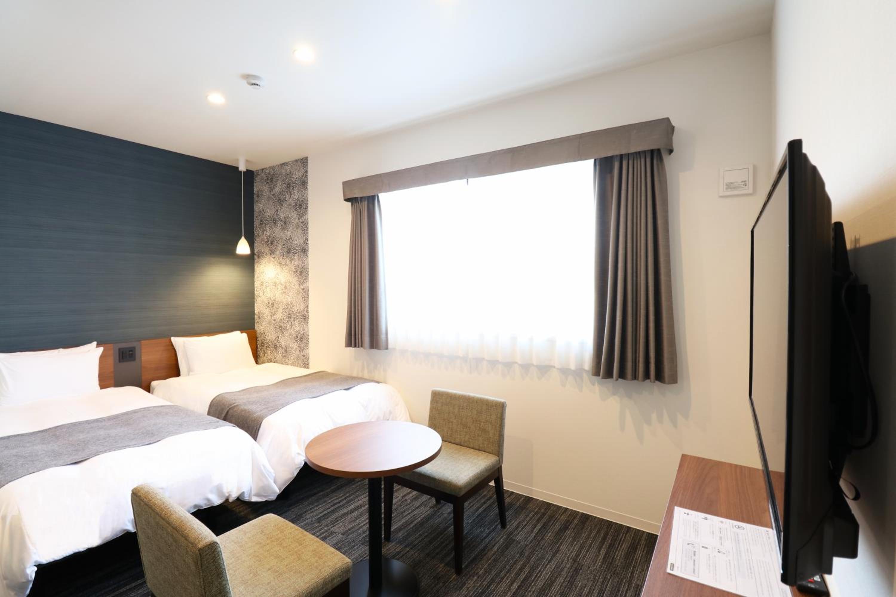 Twin Room - Photo 9