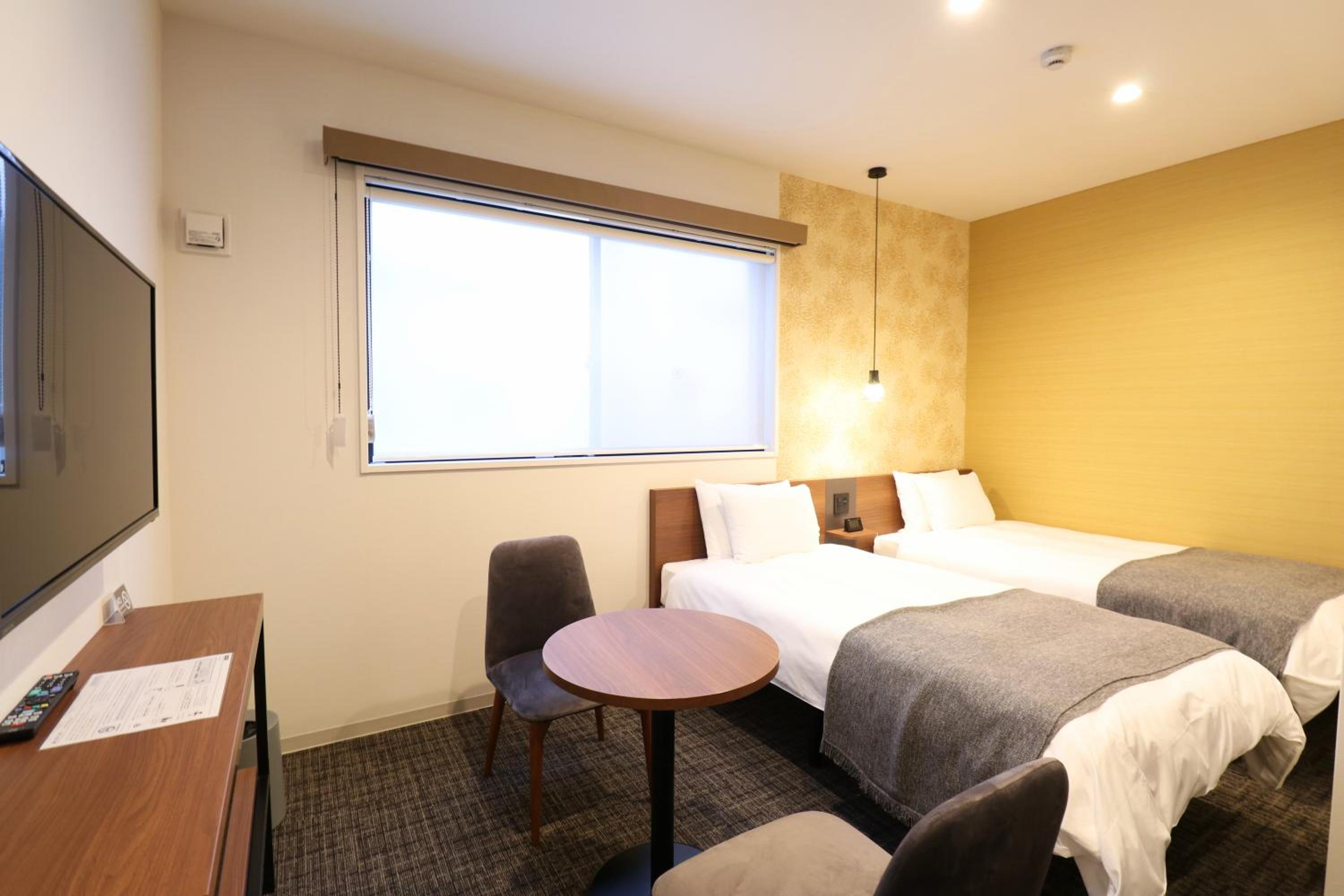 Twin Room - Photo 7