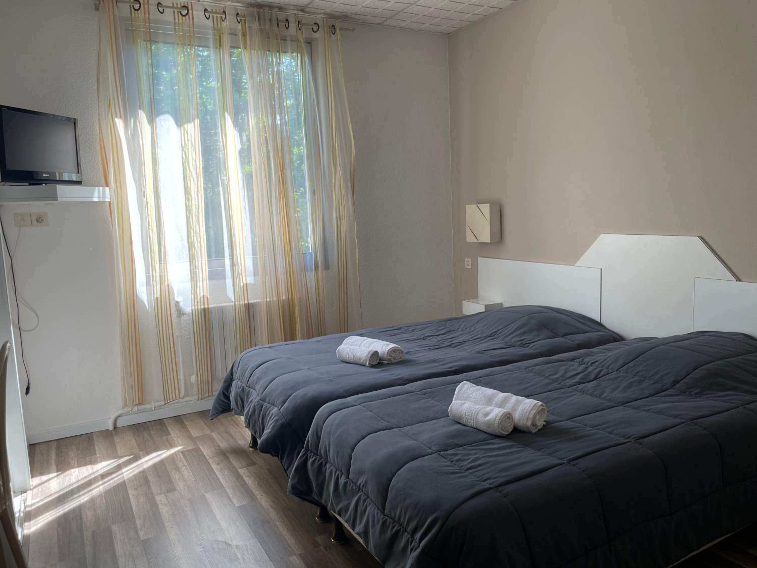 Twin Room - Photo 1