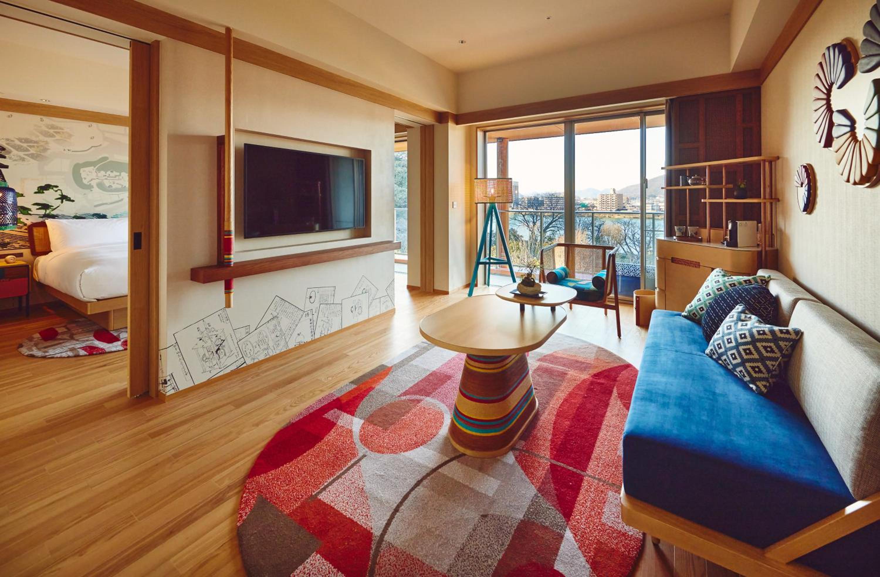 One-Bedroom Suite with Balcony - Furnished - Photo 1