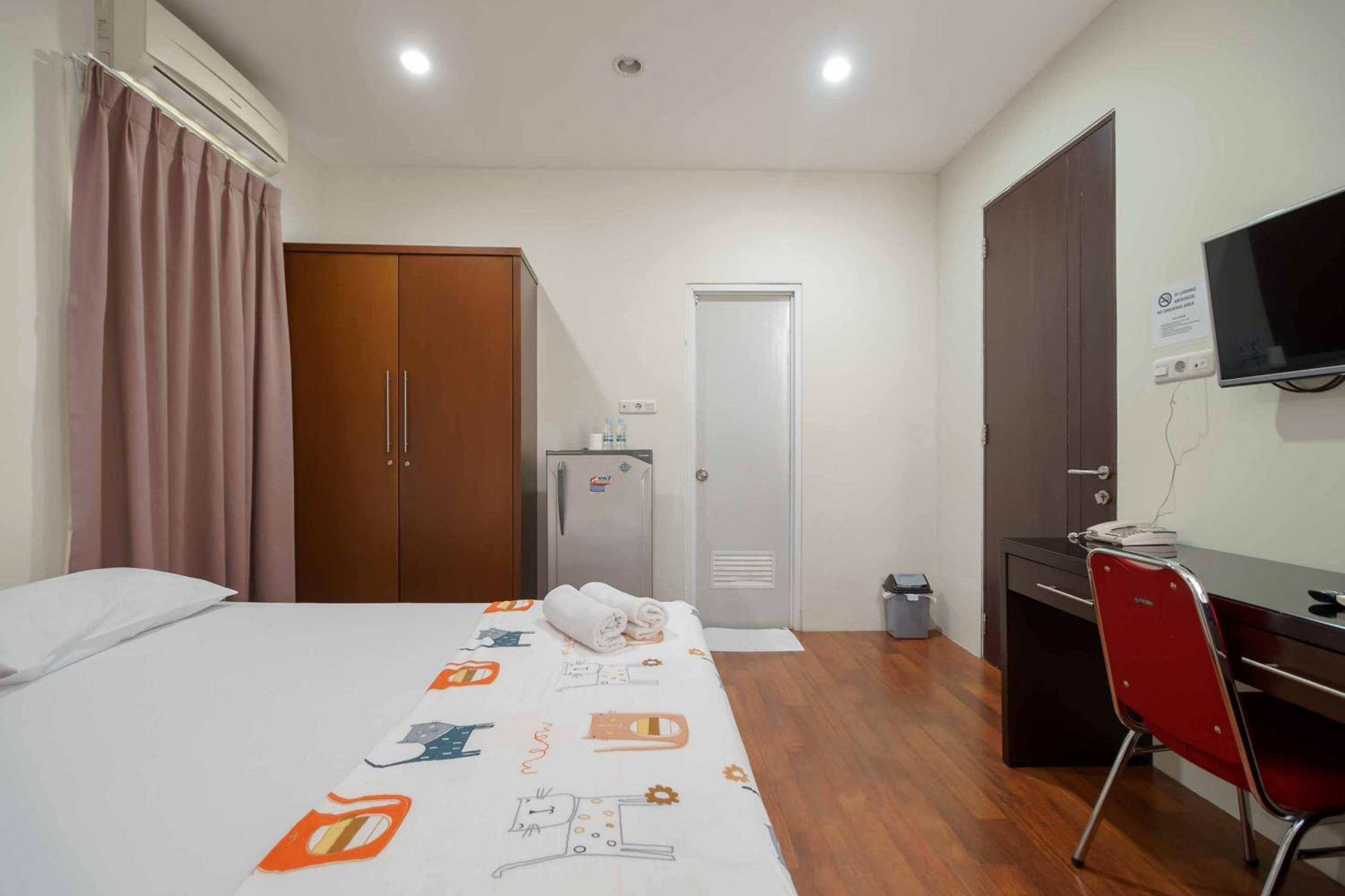 Deluxe Room - Photo 11
