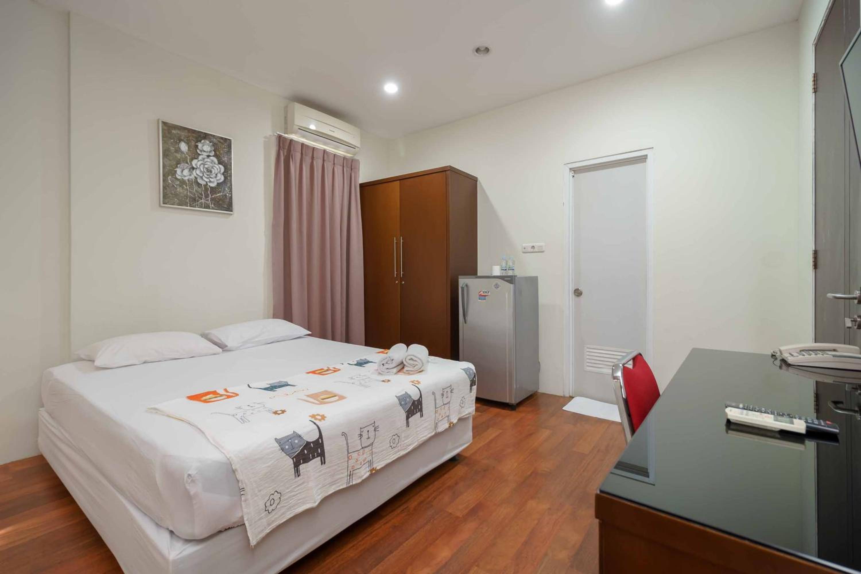 Deluxe Room - Photo 9