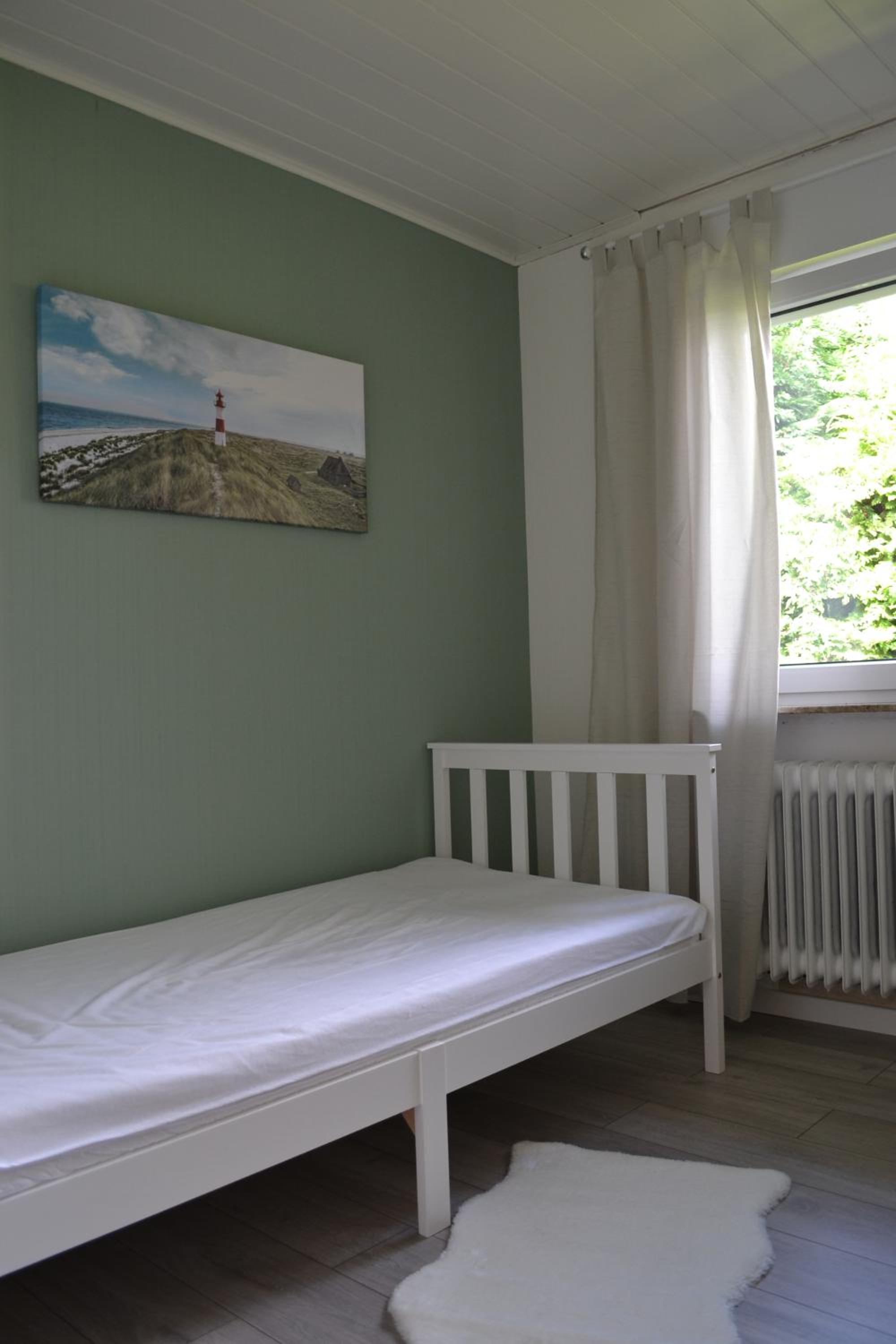 Three-Bedroom House photo 1