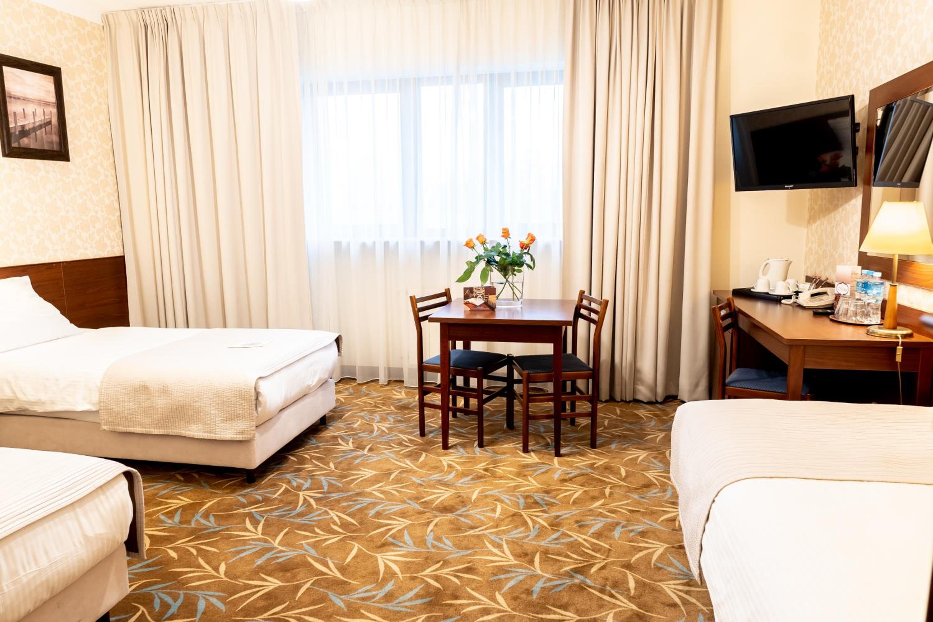 Triple Room - Photo 1
