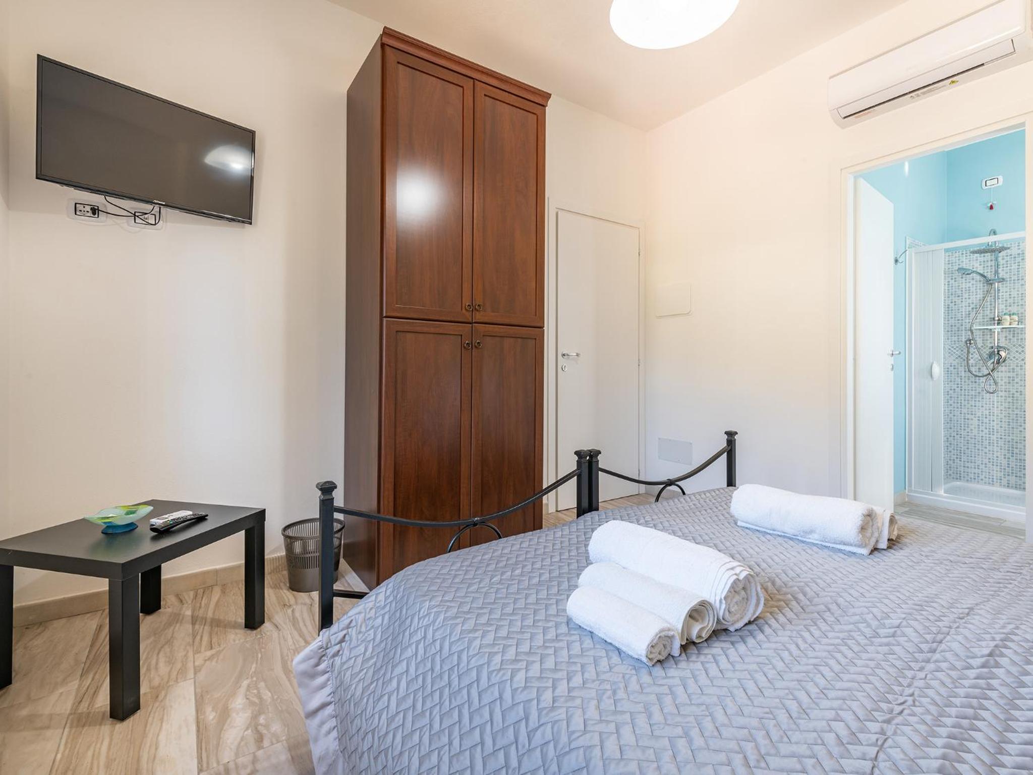 Three-Bedroom Apartment - Photo 32