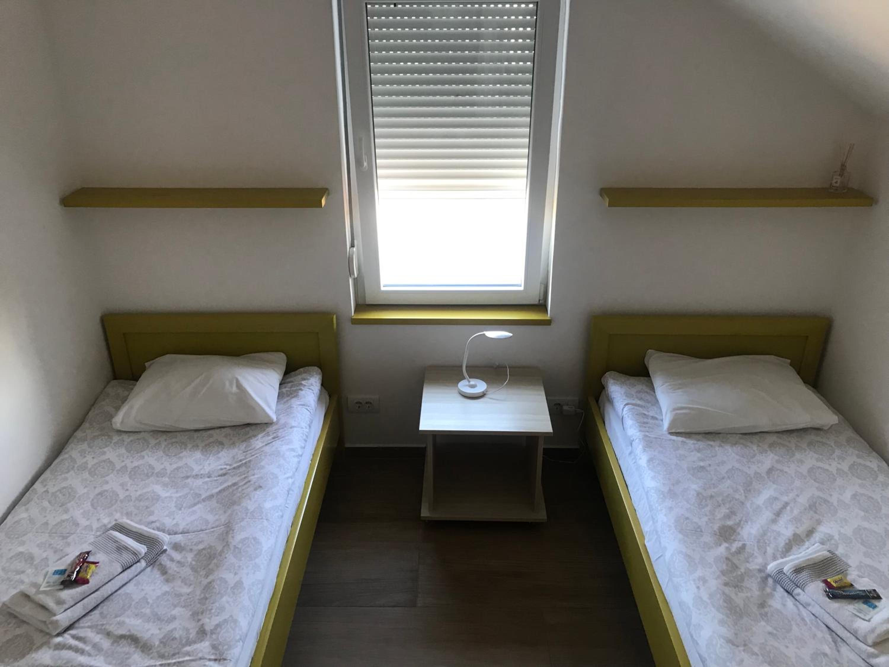 Twin Room With Shared Bathroom