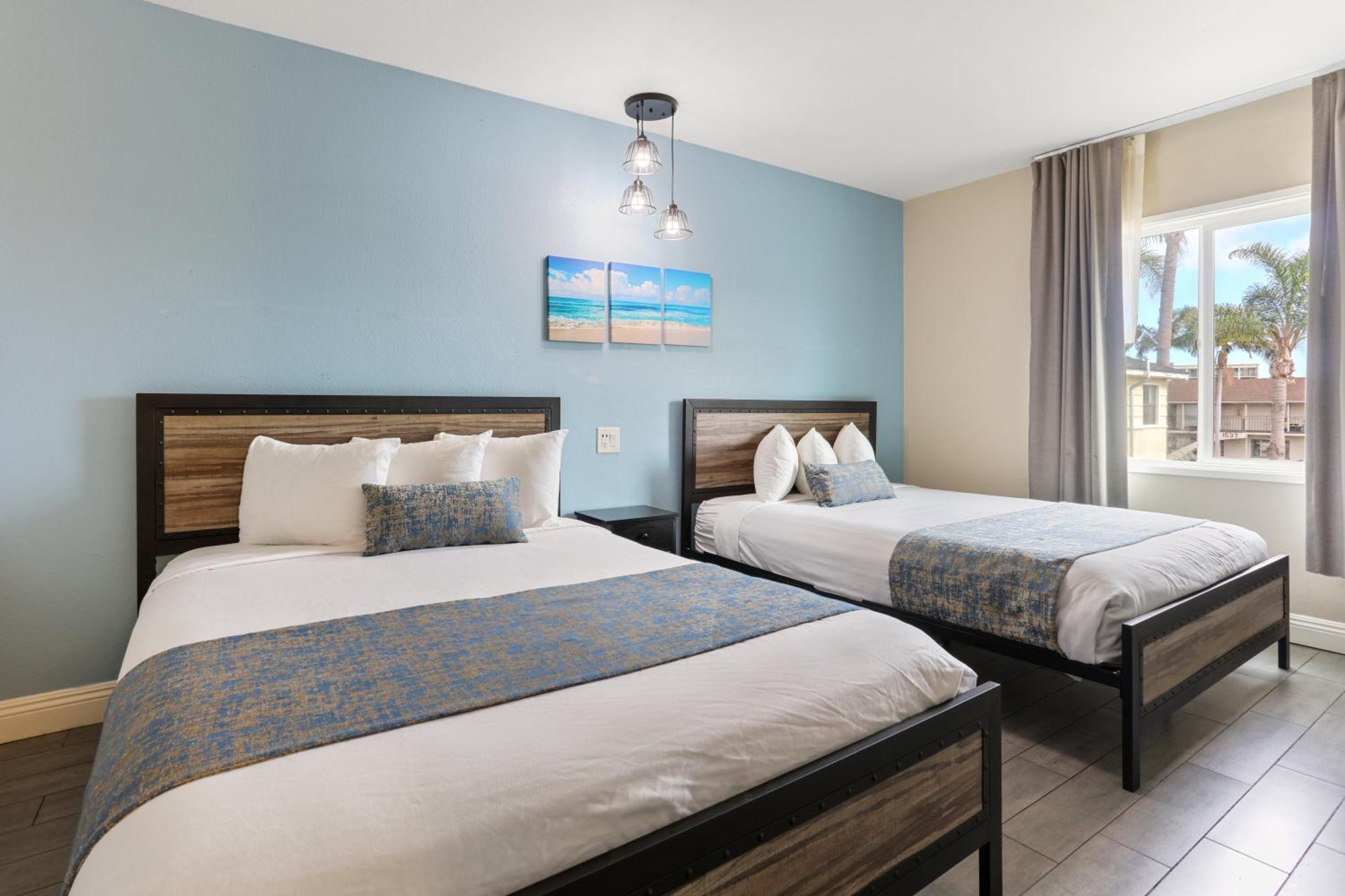 Queen Room with Two Queen Beds - Photo 1