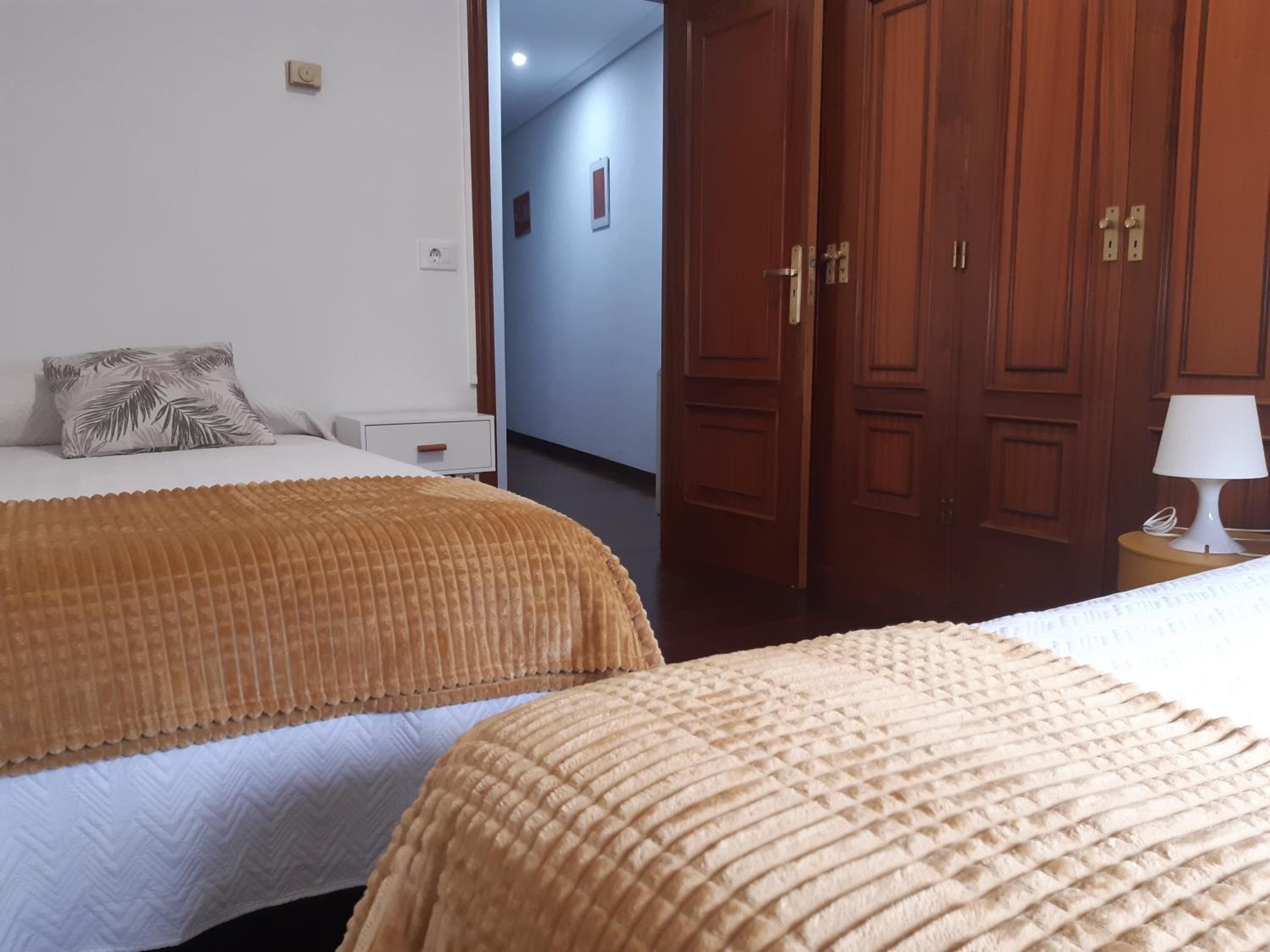 Three-Bedroom Apartment - Photo 2