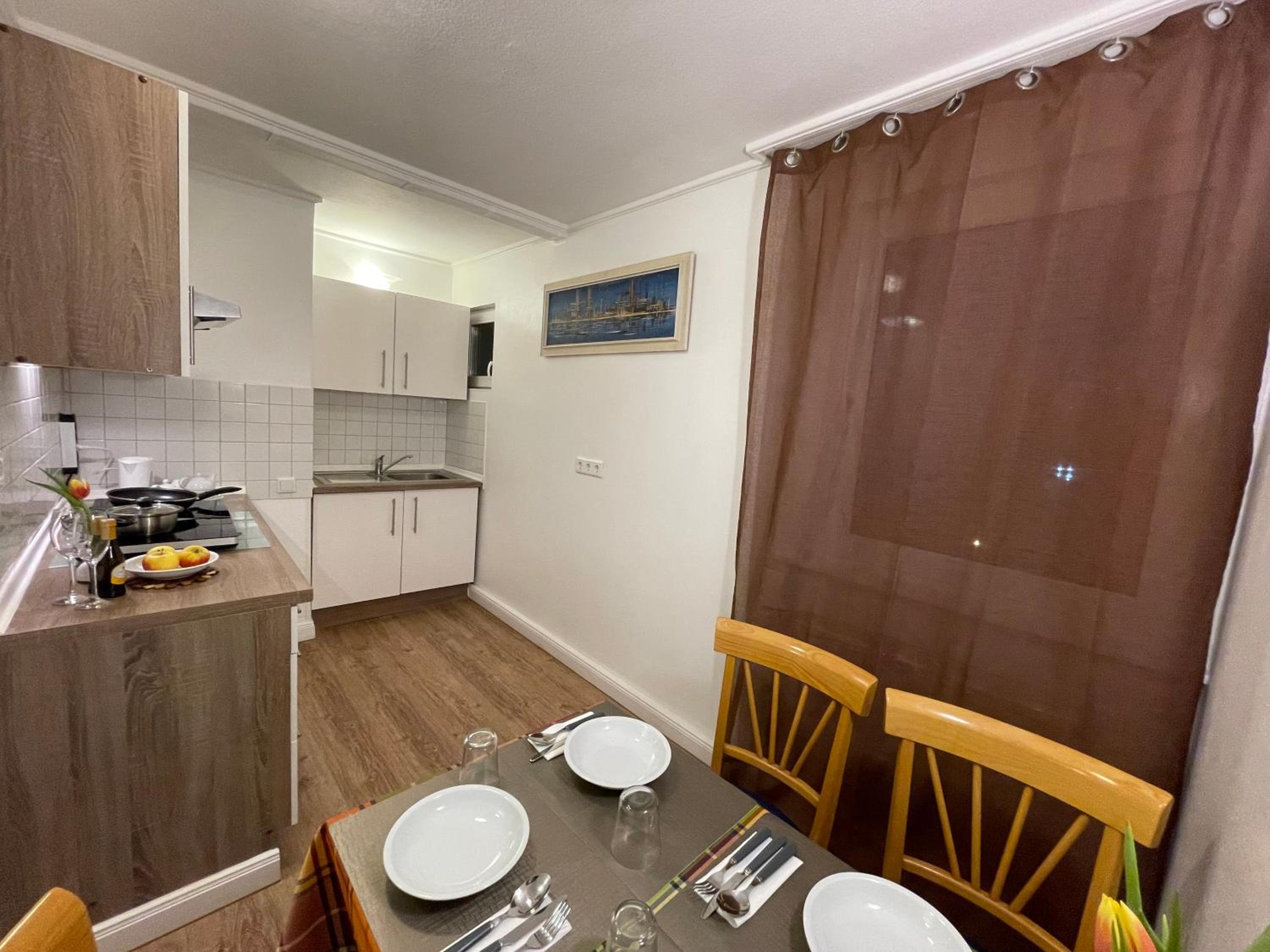 Three-Bedroom Apartment photo 2