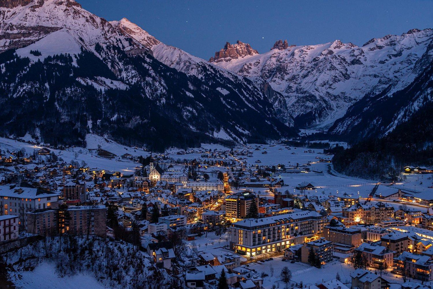 view of a town in the middle of the mountains