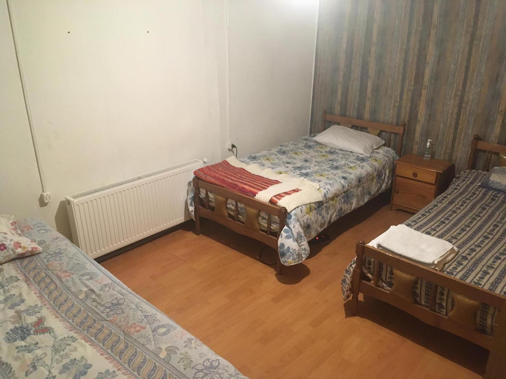 Basic Triple Room with Shared Bathroom photo 1