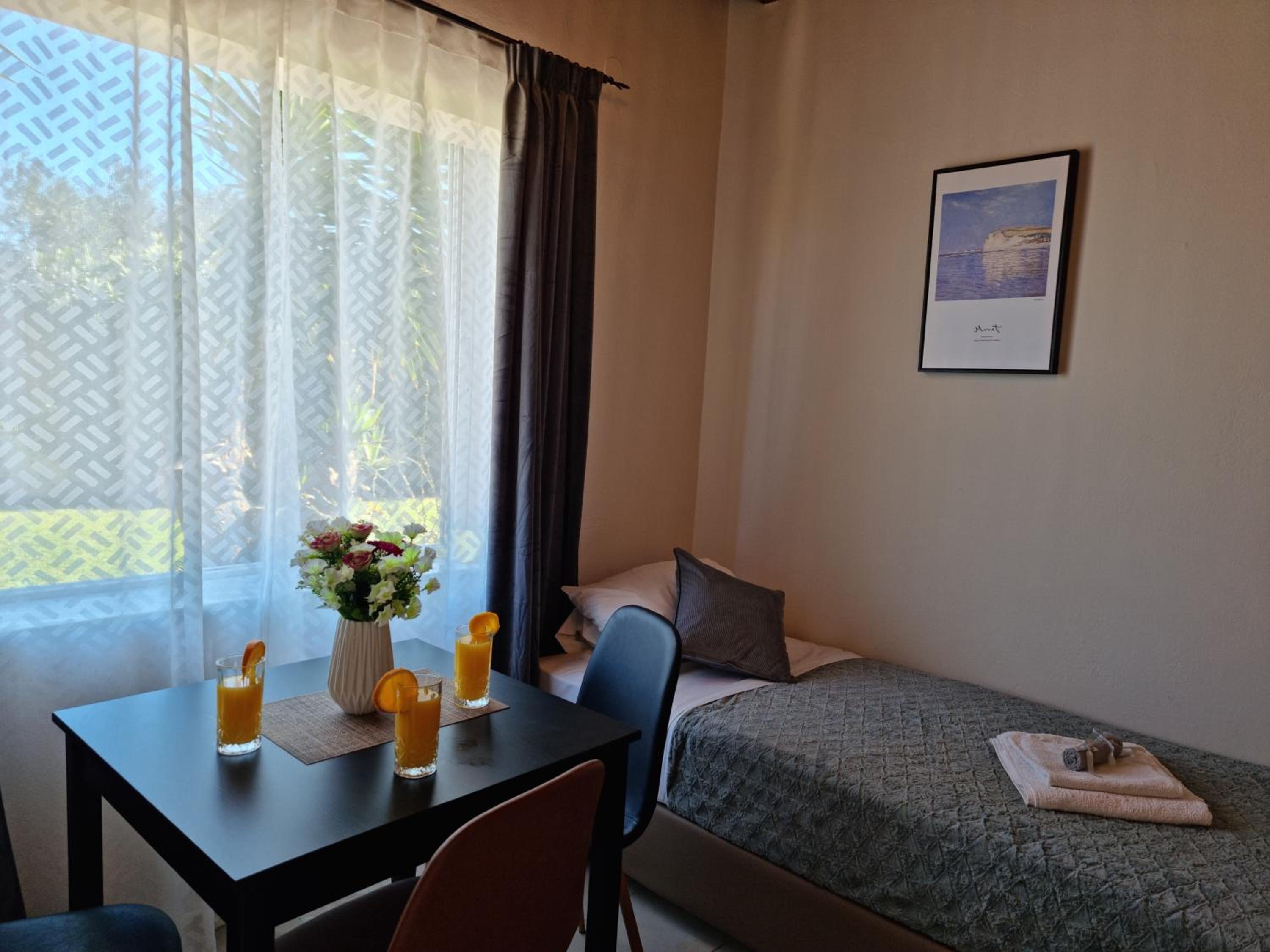 Triple Room with Garden View - Photo 1