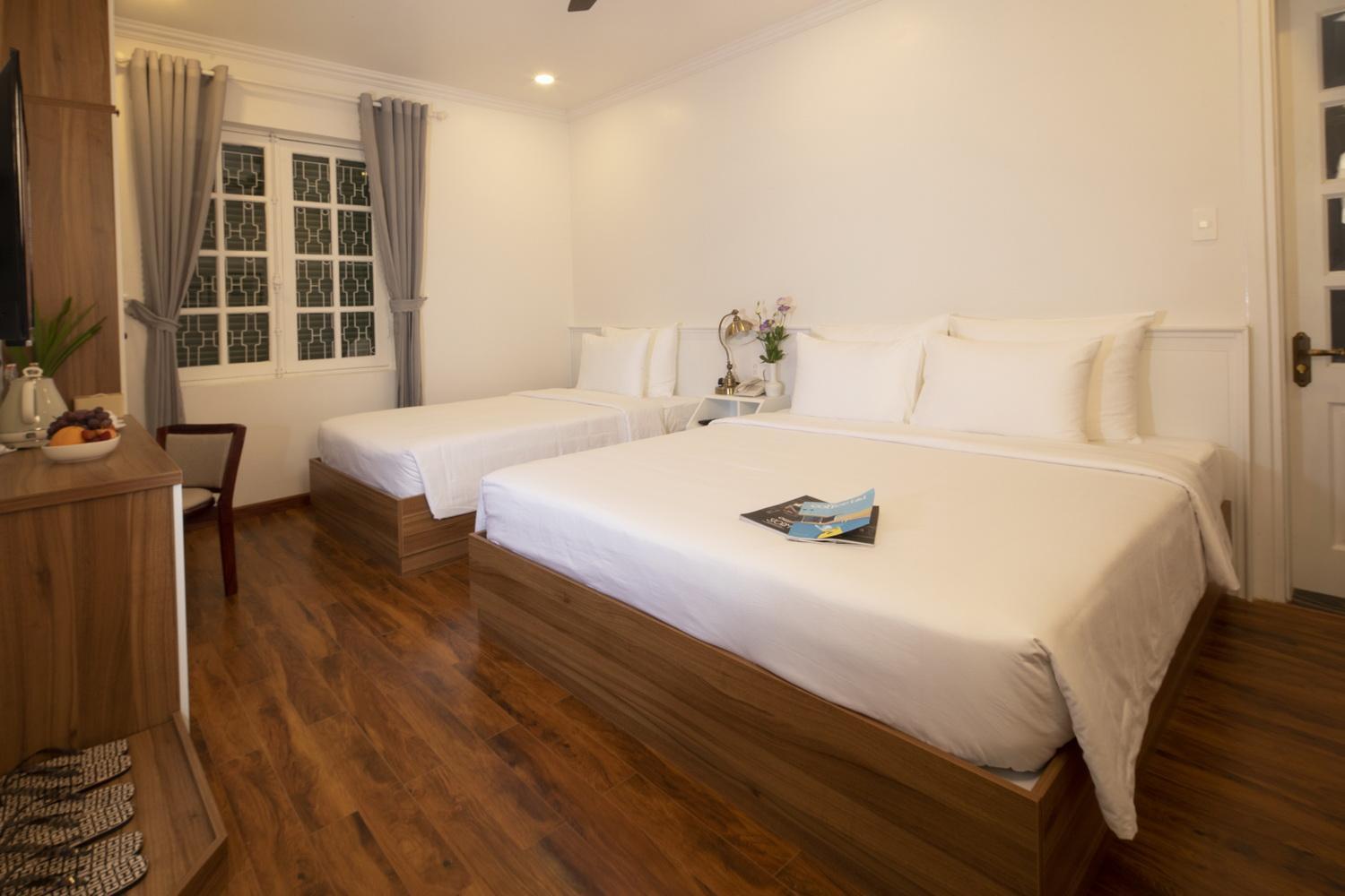 Deluxe Triple Room - Photo 1