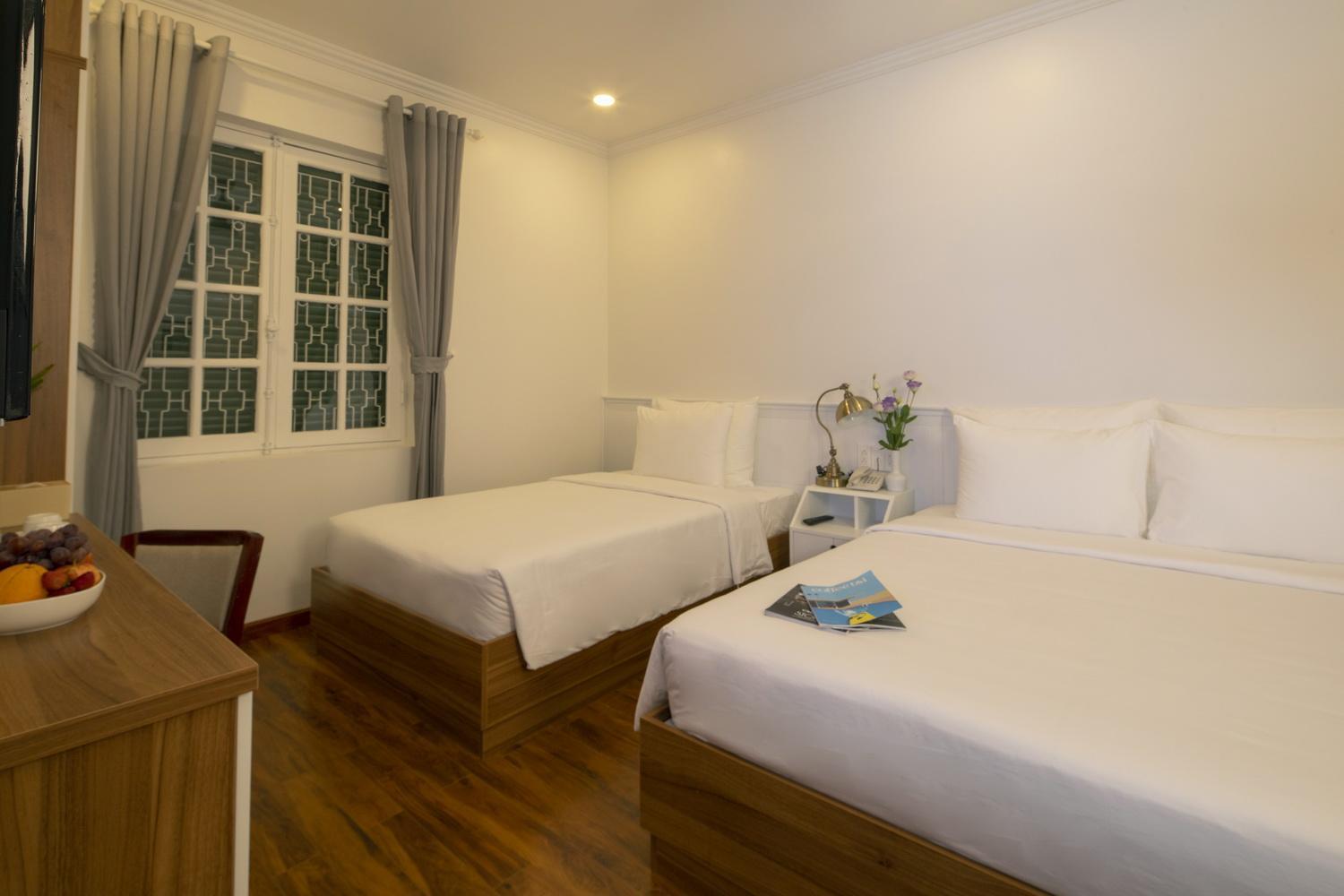 Deluxe Triple Room - Photo 24