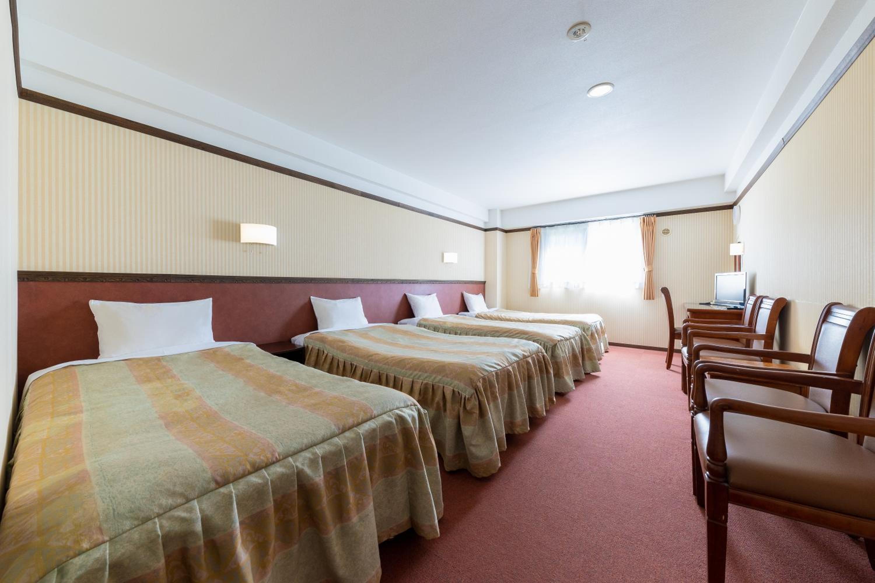 Quadruple Room - Non-Smoking - Photo 1