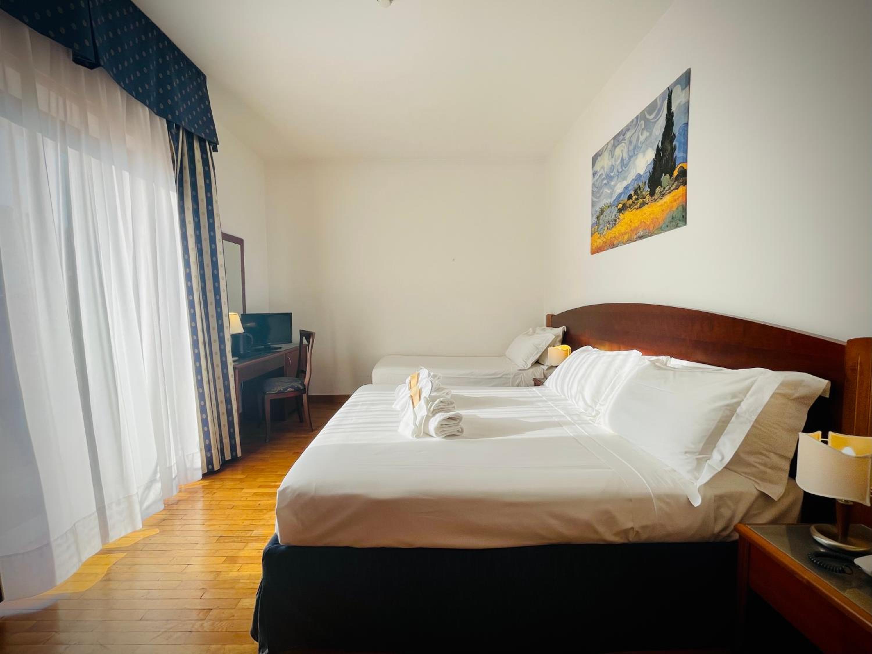 Triple Room - Photo 1