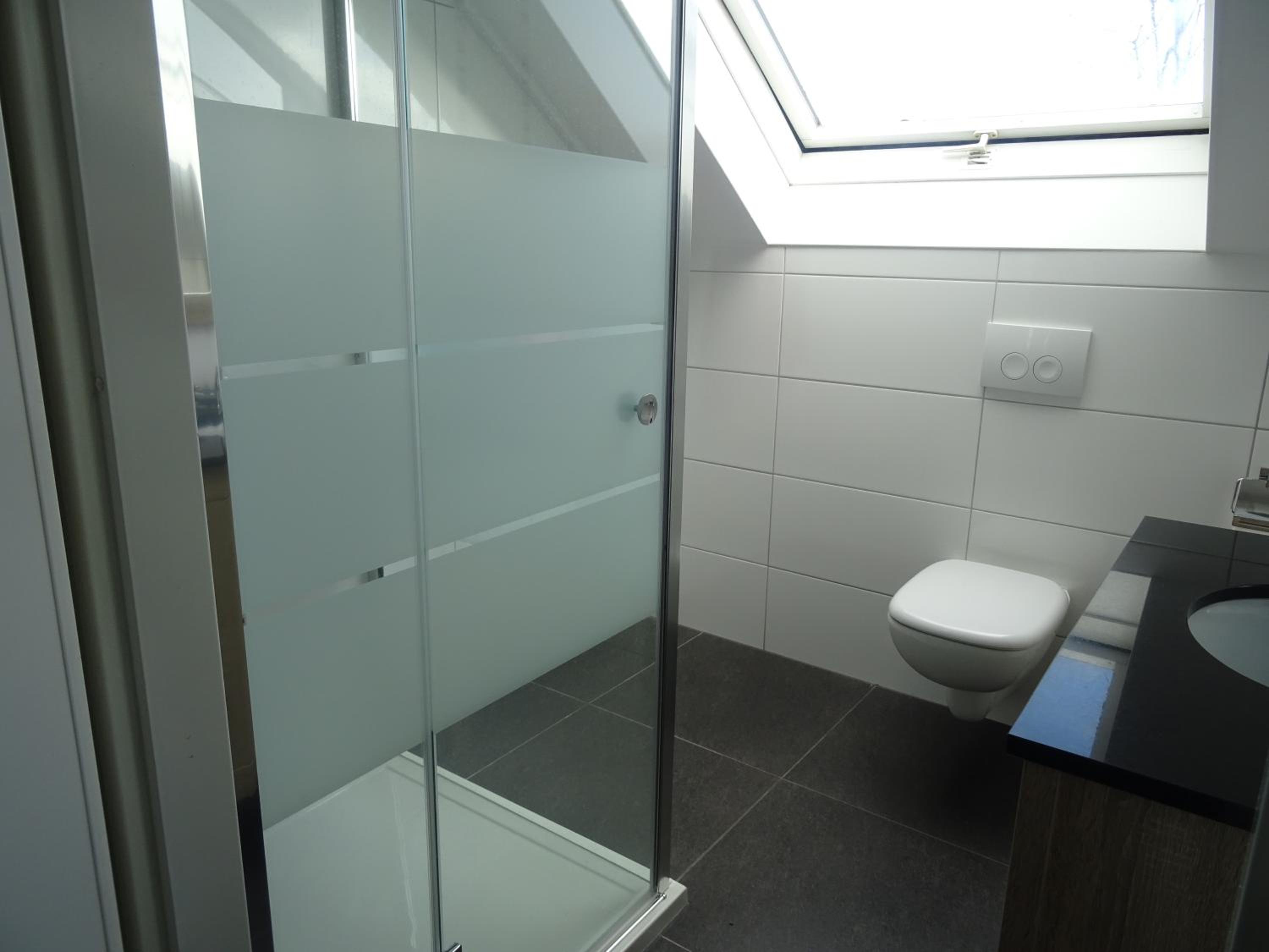 Three-Bedroom House - Photo 2