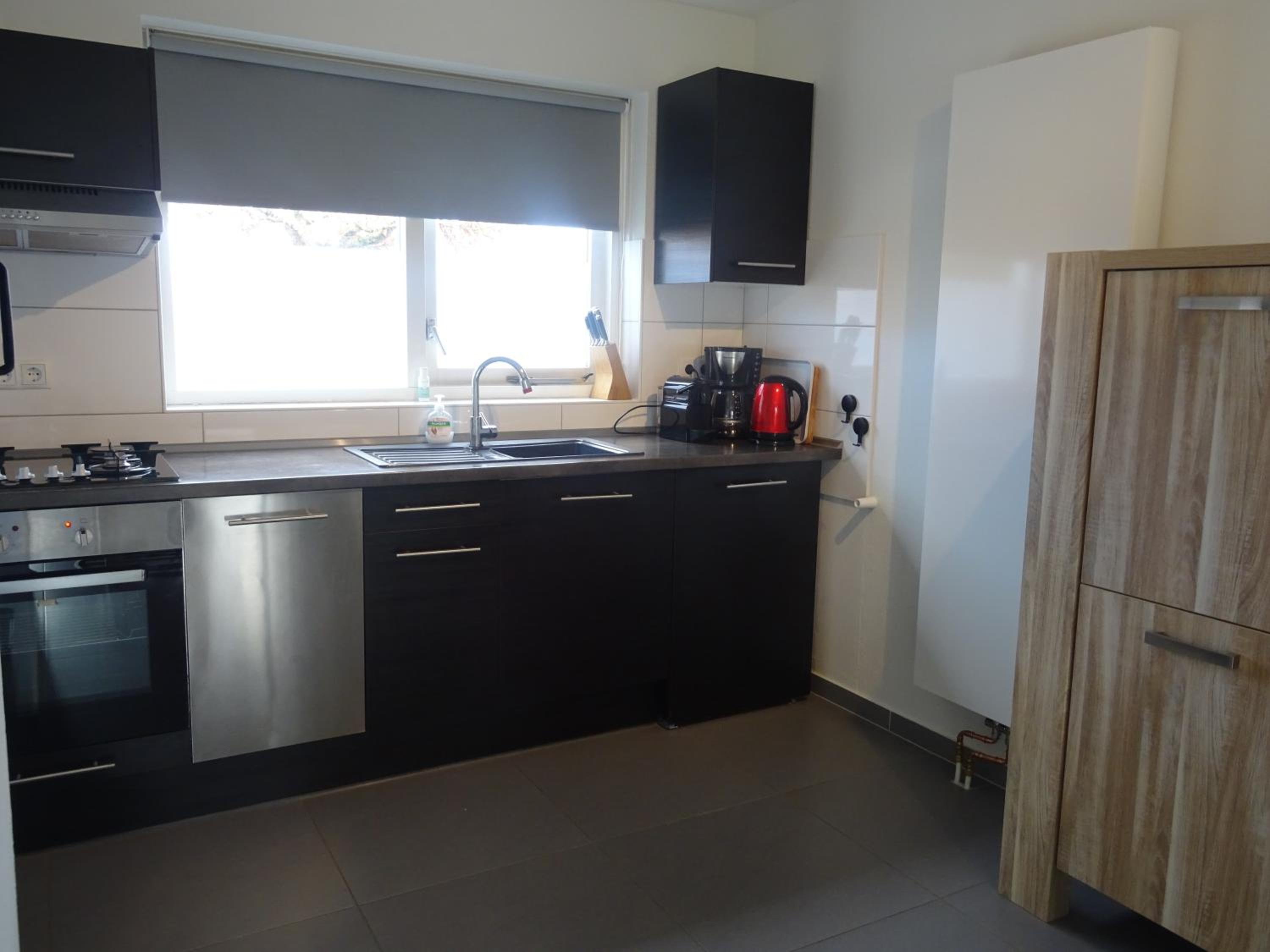 Three-Bedroom House - Photo 6